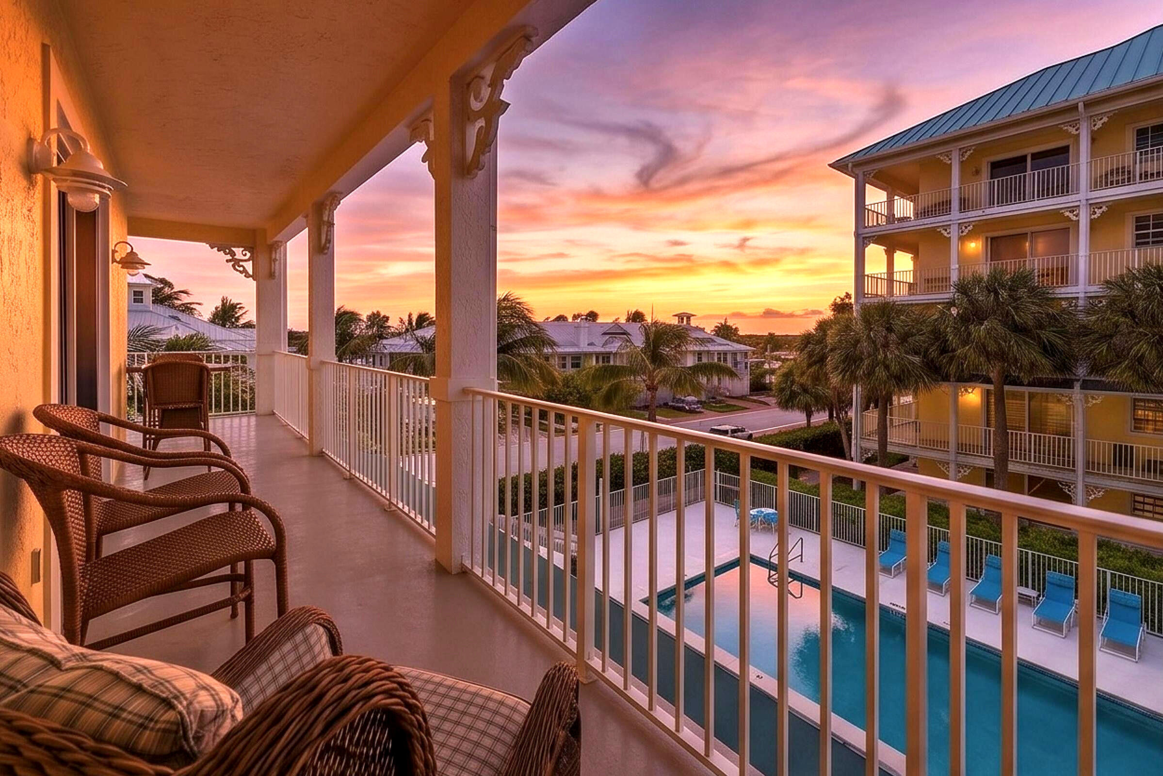 Welcome to coastal luxury at Juno Ocean Walk! Perfectly situated on the third floor with private elevator access, this beautiful condo offers the ultimate South Florida resort lifestyle. Featuring a premium, light-filled southwest exposure offering mesmerizing sunset views every single evening from your massive wrap-around balcony. Enjoy a picturesque backdrop overlooking the serene community pool and stunning Juno Dunes Natural Area/ Preserve. Boasting an open-concept split-floor plan, this pristine beach condo features a spacious kitchen, dynamic dining/living areas, 9-ft ceilings, complete impact glass windows, and a versatile third bedroom that easily doubles as a home office or den.  Live the ultimate beach lifestyle in a highly walkable location! Take a short stroll to the iconic Juno Beach Pier and the pristine beach, enjoy a bike ride along beautiful Ocean Drive, or walk over to excellent dining and shopping options right next door at the Bluffs Square Shoppes. Complete with a 1-car garage, fitness center, and a beautiful clubhouse, this Key West-style paradise is ready for you!