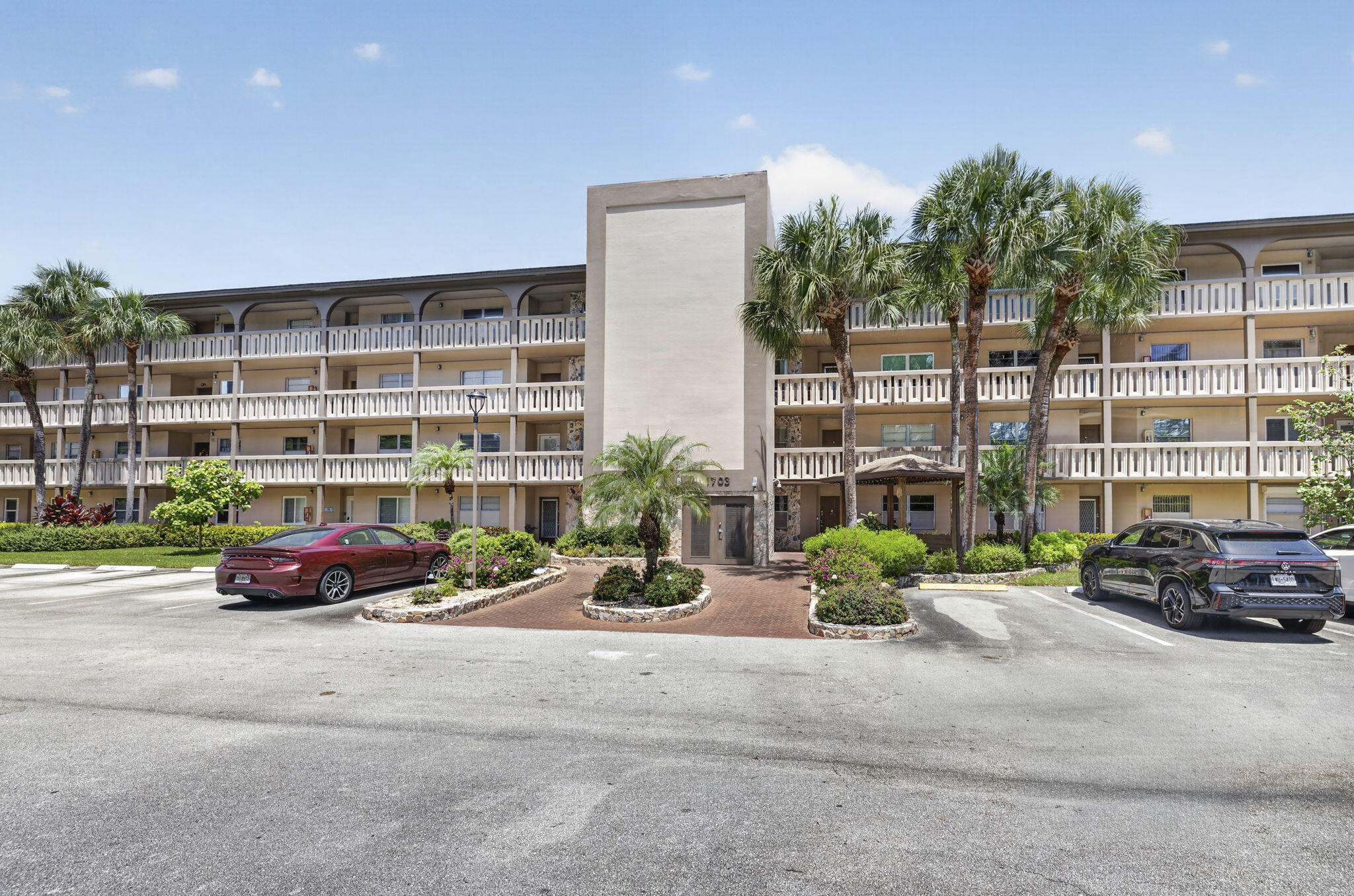 Welcome to this waterfront condominium in Andros Village C, located in Coconut Creek. Impact windows on the patio. All other windows have hurricane shutters.  This thoughtfully designed two-bedroom, two-bathroom residence offers 1,157 square feet of finished living space across four floors, providing an efficient layout for modern living. The waterfront location adds a distinctive appeal to the property, creating a serene setting for residents. Positioned within an established community, this condo presents a practical opportunity for those seeking waterfront living in the Coconut Creek area.
