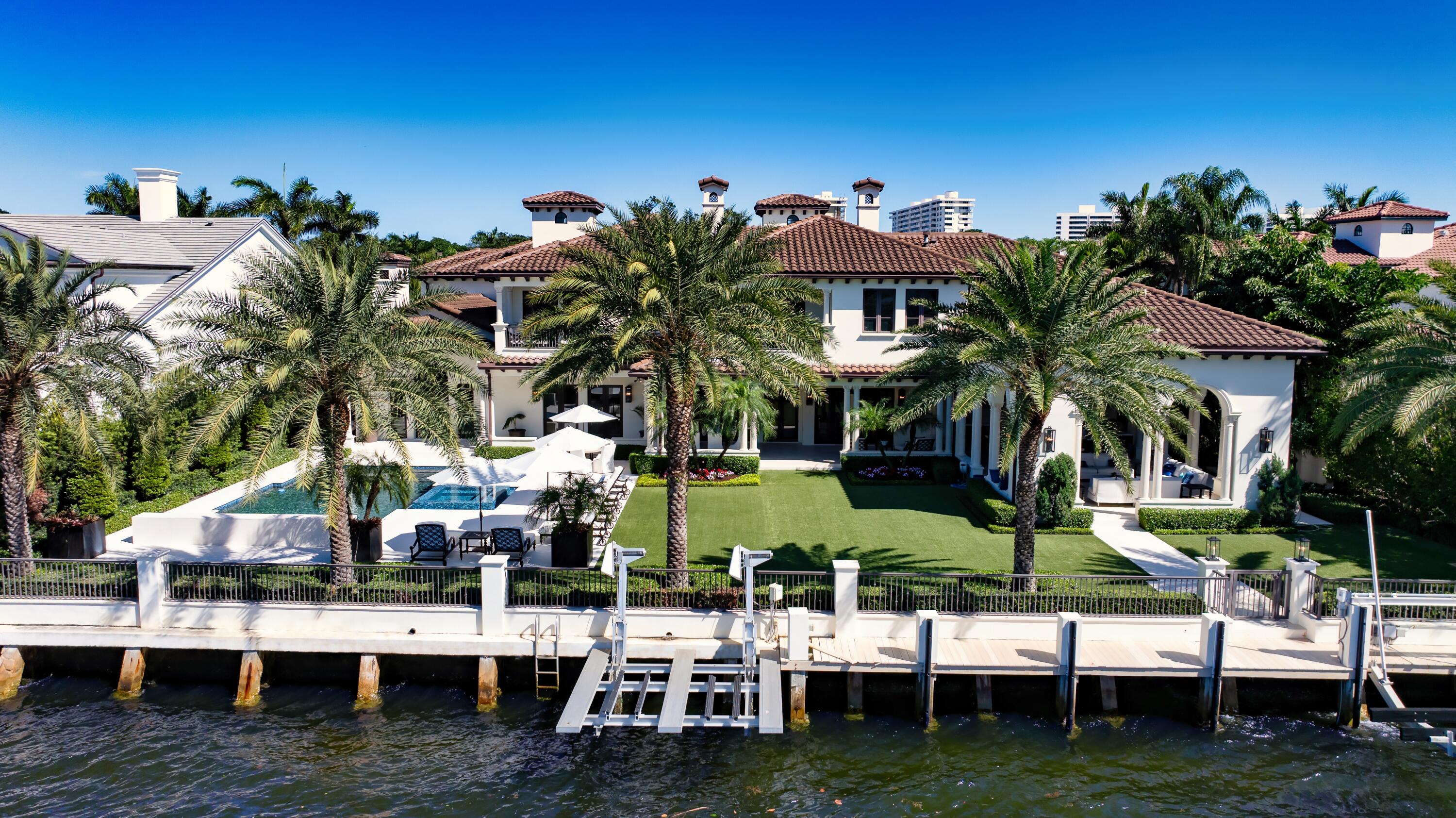 Fronting the Intracoastal Waterway in Old Boca Raton's prized beachside enclave, this newly and completely renovated Montecito-inspired jewel creates the ultimate showplace for entertaining. Synonymous with Boca Raton's world-class resort lifestyle, the prestigious Estate Section provides the setting for this estate fronting 135± feet on the Intracoastal Waterway on scenic Spanish River Road, a short distance from the beach and legendary ''The Boca Raton''. A vision of beauty with picturesque rooflines and elegant palm-studded gardens, this custom-built residence was created by prominent Palm Beach-based master builder Dan Swanson of Addison Development. The updated and modern finishes carry through the magnificent light-filled interiors which are nuanced with clean-lined architectural elements in fresh refinement. For those with a passion for entertaining and hosting outdoor social events in the grand tradition, the impressive settings range from formal and casual living and dining areas to the expansive billiard/pub room, monumental loggia, dramatic water feature and pool. Five bedroom en-suites feature sumptuous master quarters designed as an indulgent retreat with a romantic waterside balcony plus two separate studies, wardrobe rooms, and baths. Orchestrated to perfection, complete with a dock and boat lift, this stunning Intracoastal estate fulfills every desire of today's discerning lifestyle.

DISCLAIMER: Information published or otherwise provided by the listing company and its representatives including but not limited to prices, measurements, square footages, lot sizes, calculations, statistics, and videos are deemed reliable but are not guaranteed and are subject to errors, omissions or changes without notice. All such information should be independently verified by any prospective purchaser or seller. Parties should perform their own due diligence to verify such information prior to a sale or listing. Listing company expressly disclaims any warranty or representation regarding such information. Prices published are either list price, sold price, and/or last asking price. The listing company participates in the Multiple Listing Service and IDX. The properties published as listed and sold are not necessarily exclusive to listing company and may be listed or have sold with other members of the Multiple Listing Service. Transactions where listing company represented both buyers and sellers are calculated as two sales. "No payments made until title passes" Some affiliations may not be applicable to certain geographic areas. If your property is currently listed with another broker, please disregard any solicitation for services. Information published or otherwise provided by seller, listing company or its representatives is deemed reliable but are not guaranteed and subject to errors, omissions, or changes without notice. Copyright 2024 by the listing company. All Rights Reserved.