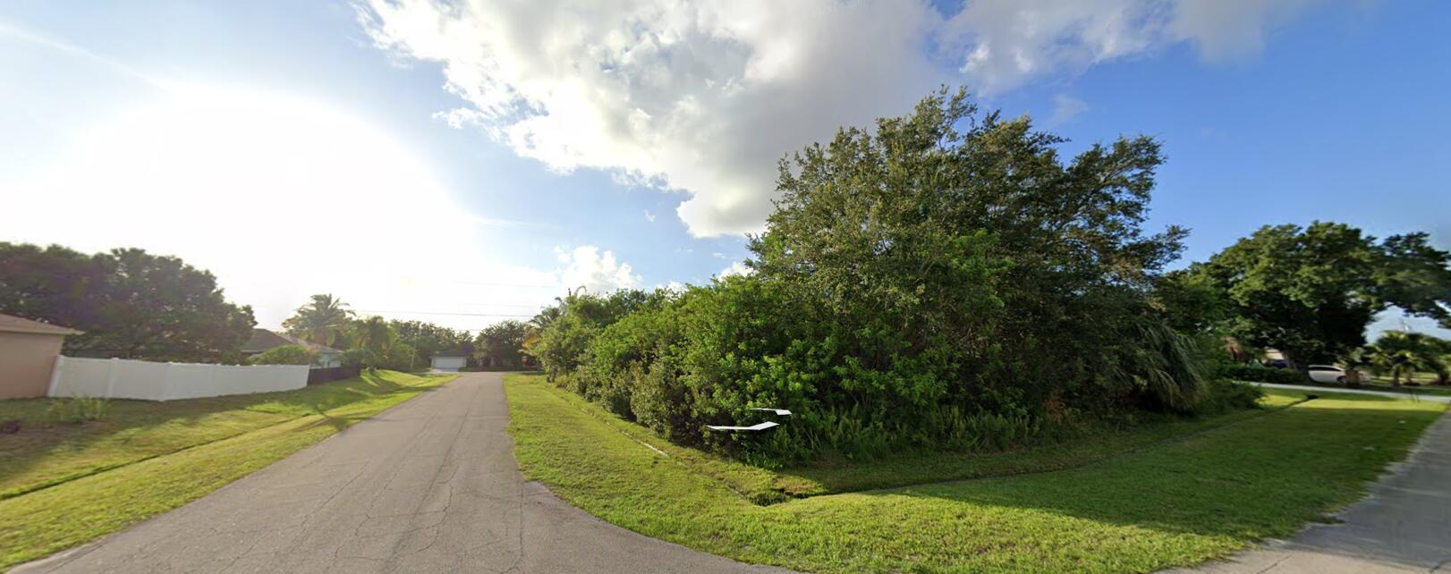Rare, Gorgeous, Corner Lot just north of Becker Road. Ideally situated near I 95 and the Turnpike. Minutes from Tradition's vibrant recreational activities, without an HOA. If you are looking for convenience and location to build your forever home, THIS SPACIOUS LOT IS A MUST SEE!