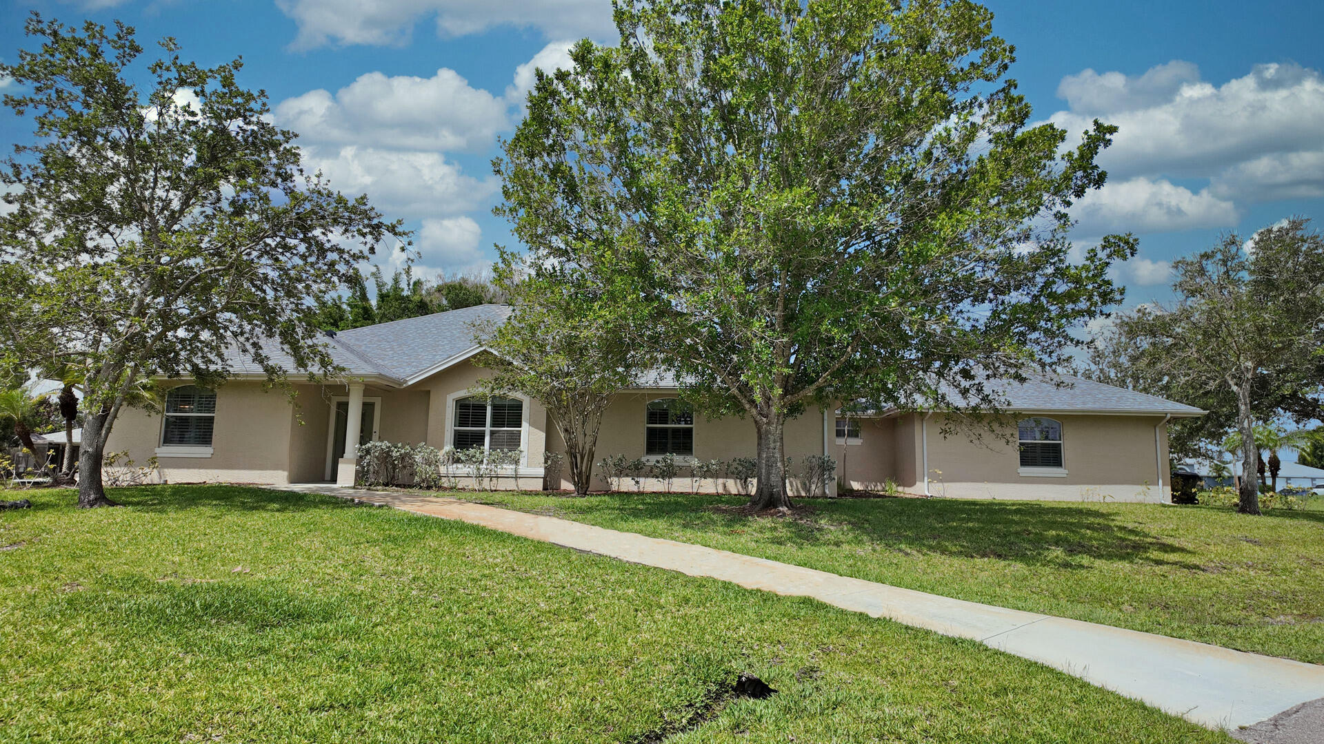 Professional photos coming soon!  Bring your boats! Just 2 minutes from the C24 Ocean Access Boat Ramp Park!  This CBS 4/3/2 is located in desirable Southbend Lakes! Extensively remodeled, incl. a brand new Chef's kitchen w/gas cooktop, double wall oven, custom cabinets and granite, coffee station, expansive center island/snack bar, granite in all baths, huge laundry room w/granite counter, sink. Situated in a quiet cul-de-sac on an oversized lot which boarders Spruce Bluff Preserve!  3,192 sq ft of comfortable living space. Included is a wheelchair accessible full bath, and wide doorways. This thoughtfully designed, property presents an excellent opportunity for multi-generational living, large families or for those who just love to entertain!  NO HOA! See supplement for more! Southbend Lakes amenities include C-24 Ocean Access Boat ramp park,  Jessica Clinton Park complete w/tennis courts, inclusive new playground, baseball, basketball, soccer field.  Minutes from Florida's Turnpike, and I95 for easy commuting! Convenient to Tradition and the Beaches!