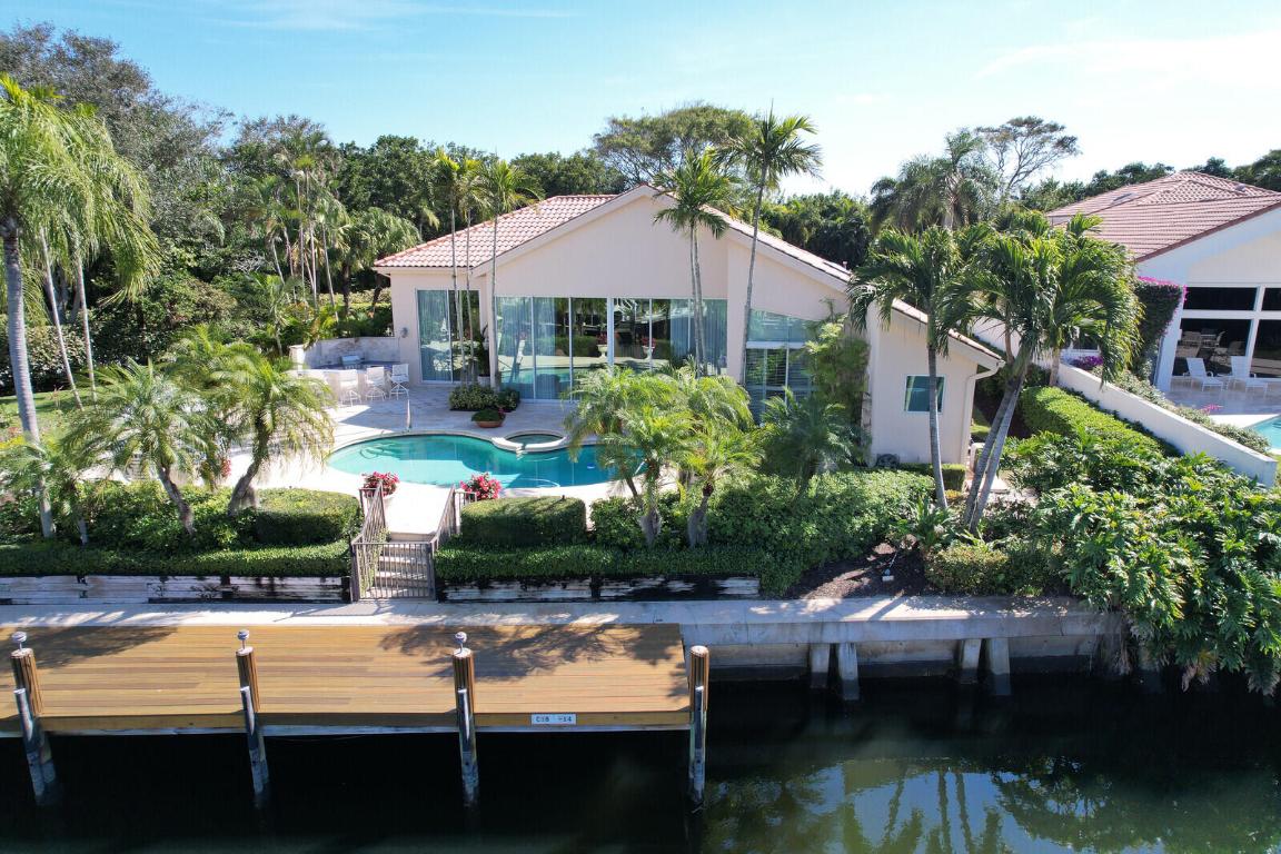 Rare, rare, rare Frenchman's Creek home for luxury resort living, including golf, beach, and boating.  No other development can top the extraordinary, lifestyle amenities offered at Frenchman's Creek Beach and Country Club!! 80' private boat dock with access to the Intracoastal and Sailfish Alley. Unique, extra wide lot so boat will not block your view even on a boat lift. Private, waterfront pool and spa. Two championship golf courses and private golf car garage. Brand new $95 million Clubhouse opening November 2025 offering industry leading hospitality in state-of-the-art facilities.....(see MORE.....) Brand new 26 court Tennis, Pickleball and Bocce complex, opened summer 2025. Beach Club with full restaurant, pool, beach chairs, umbrellas and valet parking on quiet Juno Beach. Expansive spa and fitness club, with world-class personal trainers and an extensive program of classes. Lush, manicured grounds
4-bedroom, 4.5-bath residence on extra wide, end lot. Tall ceilings with open floor plan for entertaining family and friends, including wet bar. 13' sliding impact glass doors provide ample natural light and beautiful water views for sunsets.
