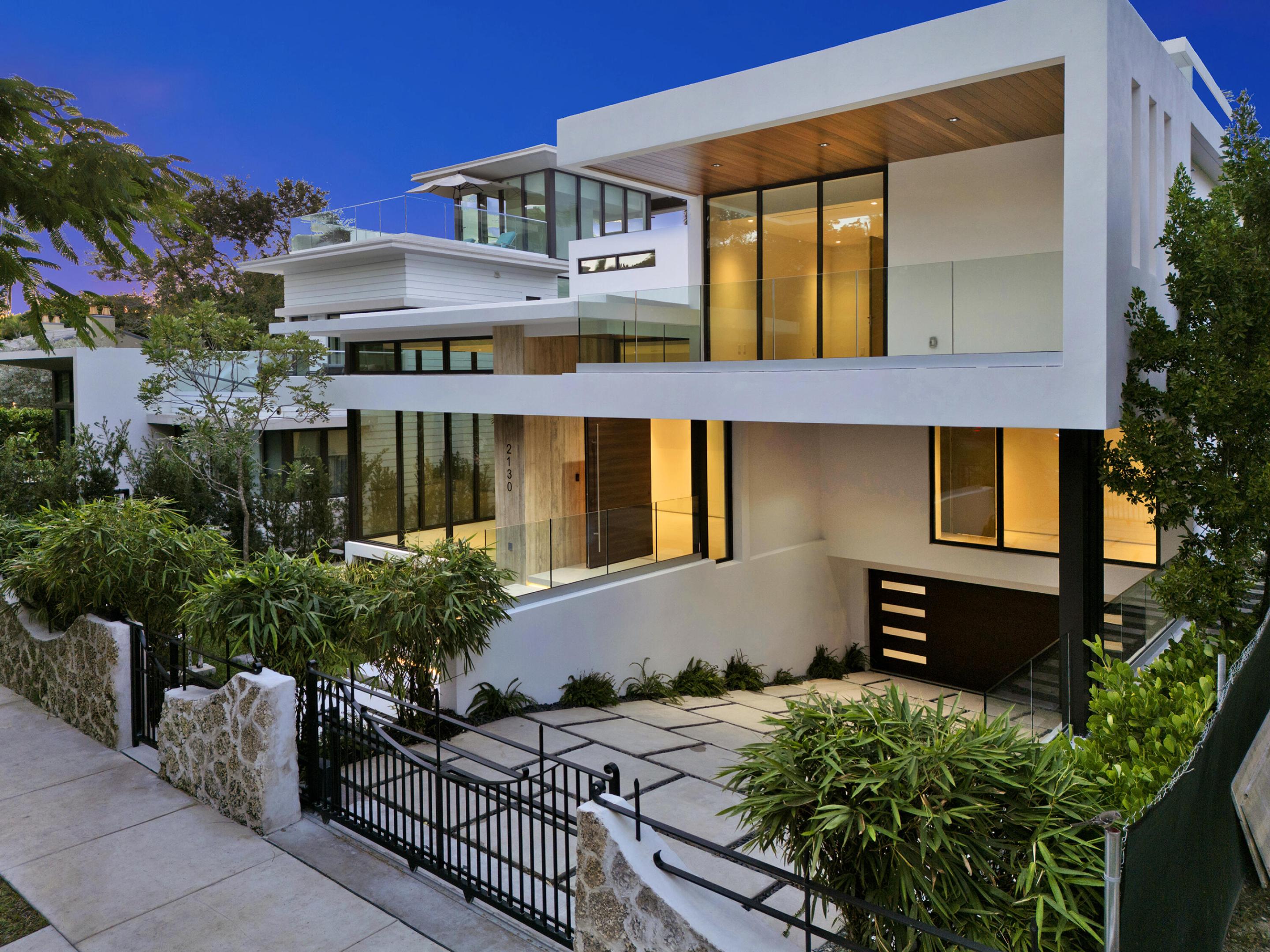 One-Of-A-Kind, 17' above the sea elevation. Experience unmatched luxury and modern refinement. This custom-built luxury residence exemplifies architectural excellence, innovative technology, and timeless design, situated on South Miami Ave. This architecturally striking residence offers 5,765 SF under air and over 11,000 +/- SF total, blending bold design with elevated living. The home features five en-suite bedrooms, service quarter, office, private storage and a six-car garage. Designed for effortless indoor-outdoor living, the open-concept living and dining, Expansive Island anchors this showpiece kitchen, designed for both daily living and gourmet entertaining. It features Gaggenau induction cooktops, a Teppanyaki station,  Gas cook top, Wolf appliances, Sub-Zero refrigerator/freezer columns, wine cooler, refrigerator drawer and two outdoor kitchens. Custom Scavolini Italian cabinetry. The 2nd floor offers generous bedroom suites with walk-in closets/spa-inspired bathrooms and 2nd floor family room. Additional features include Roof Top that overlooks Miami skyline, smart-home technology, Impact/Thermal windows and doors, gated entry. Thoughtfully designed for buyers seeking architectural distinction and privacy, in one of Miami's sought-after neighborhoods within walking distance to Brickell/Downtown.
