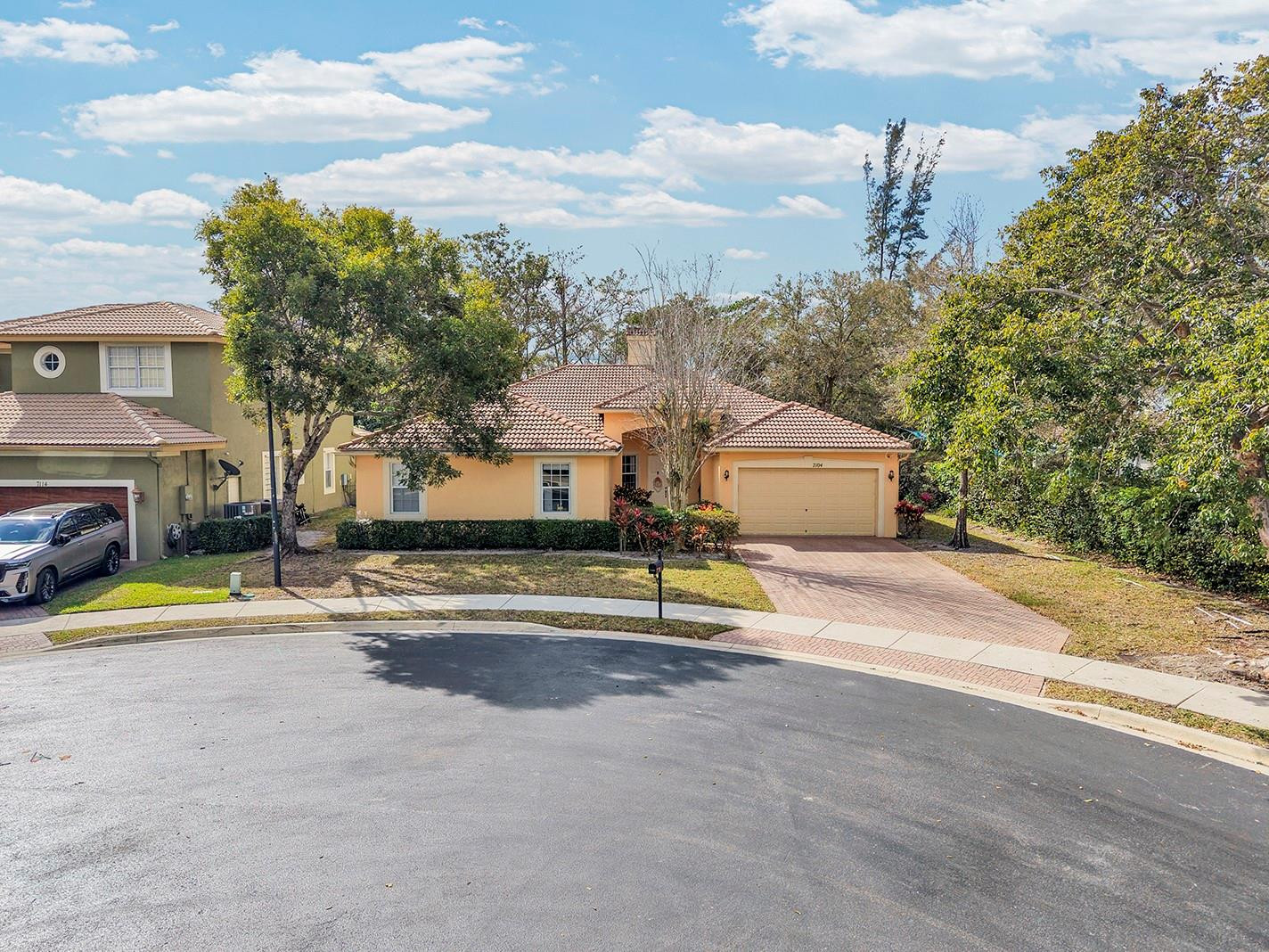 Beautiful and spacious 5-bedroom, 2-bath single-family home located in desirable Coconut Creek. Built in 2003 and offering approximately 2,710 sq ft of living space, this residence features high ceilings, an open and airy layout, and abundant natural light throughout.Enjoy a serene backyard overlooking preserved nature, creating a private and peaceful setting perfect for relaxing or entertaining. The generous floor plan provides flexibility for families, guests, or home office needs.Situated on an 8,642 sq ft lot with low HOA of $230/month, this home offers comfort, space, and value in a convenient location close to shopping, dining, parks, and major highways.
