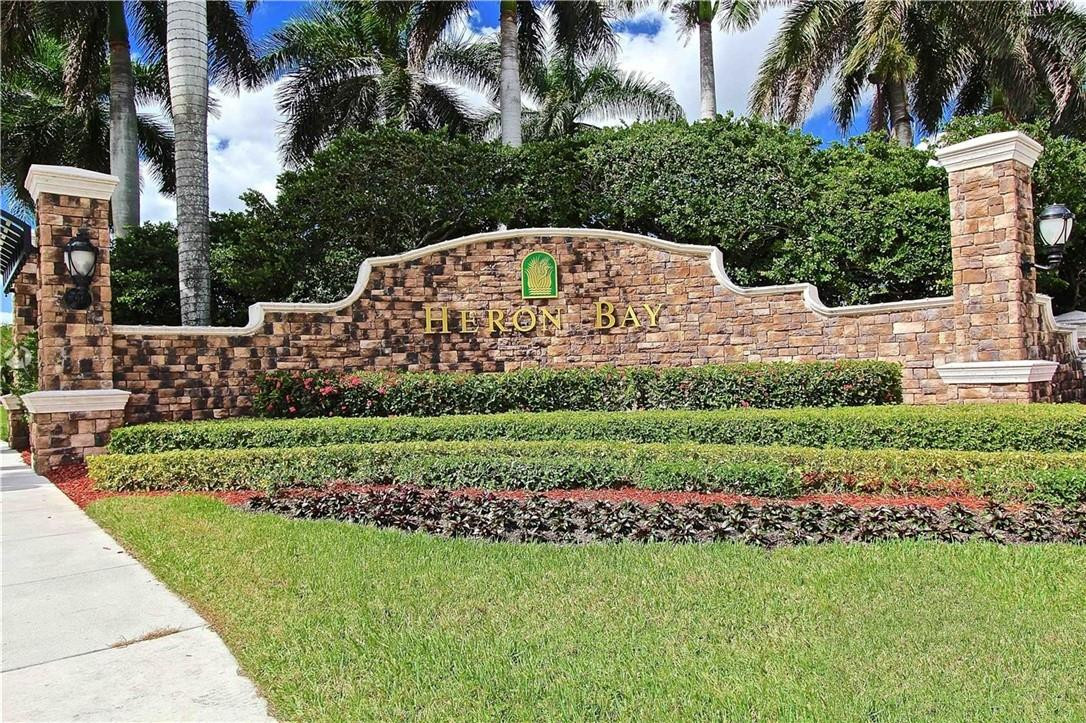 This PERFECT and hard to come by coach home in the exclusive community of Heron Bay offers this 3 bedrooms 2 bath, Gorgeous Lake View corner 1st floor Coach Home with upgrades throughout. More photos of unit will be coming soon.