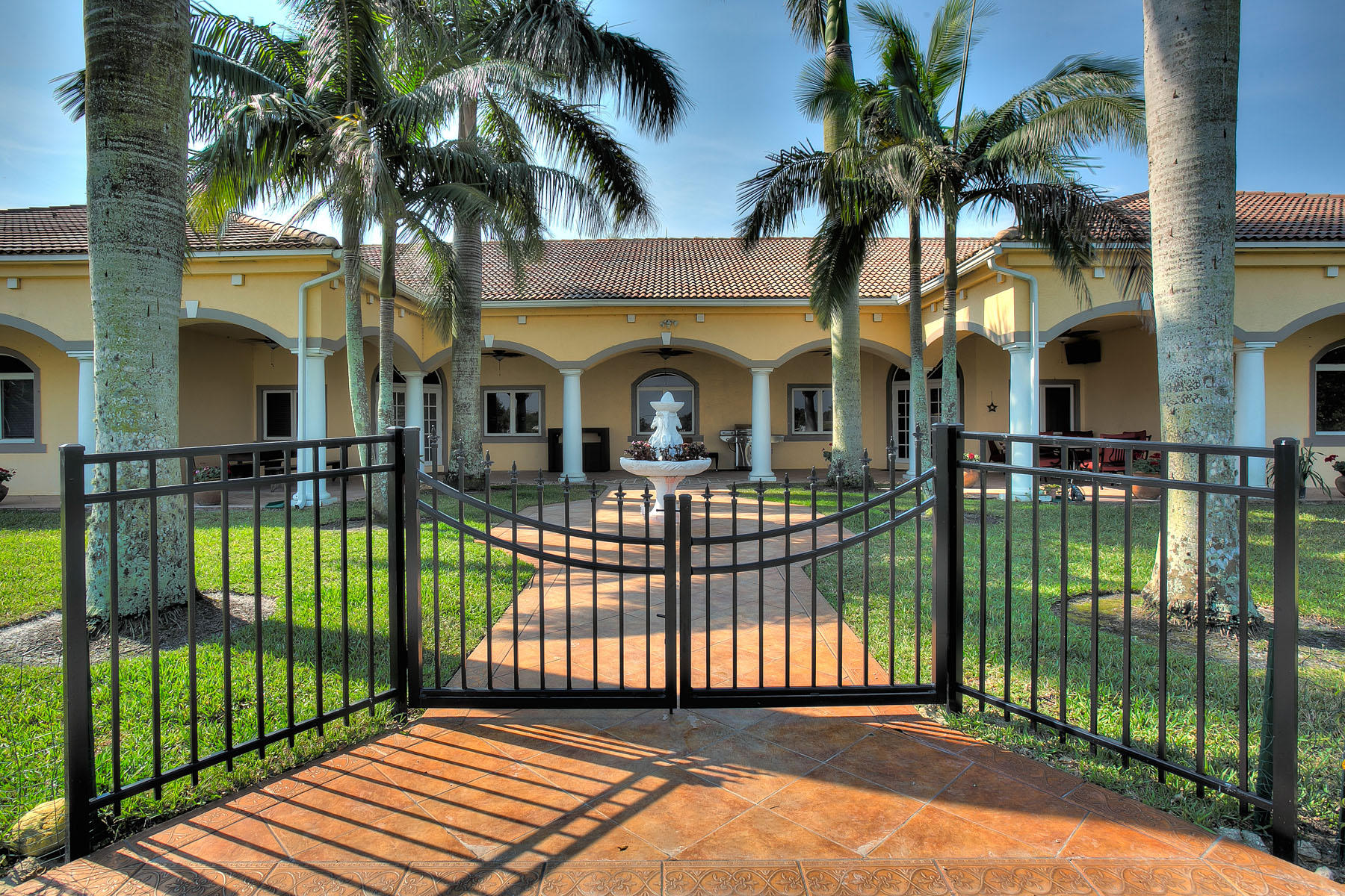 This truly is an equestrian's dream farm with a 20-stall barn (10 stalls on each side for multiple trainers if need be), tack & feed rooms and a separate 6-stall barn with a 1 bedroom, 1 bath grooms quarters! Property has 3-bedrooms in the main house with a separate 2-bedroom apartment. There are also 12-paddocks, a 150x250 arena and a 3 acre derby field. At nearly 10 acres this is an exceptional opportunity!