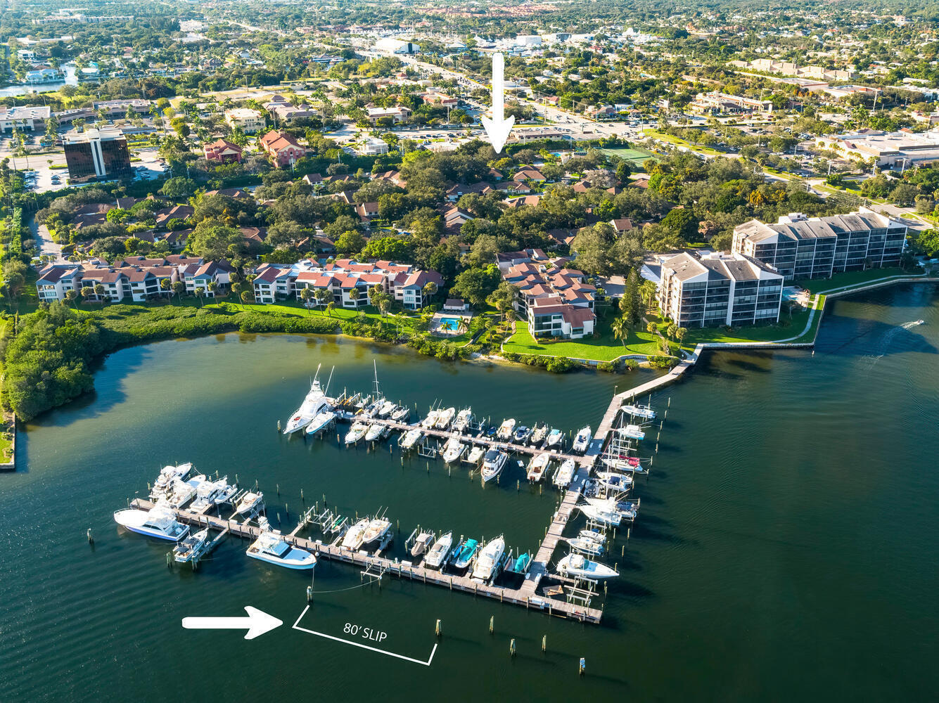 This beautiful home boasts two bedrooms and two baths, with the added luxury of an 80' dock E-3 ($1,500 + unit $3,900 total $5,400 monthly). Step inside to discover a fully updated interior adorned with exquisite furnishings and ceramic tile floors throughout. The kitchen features white cabinetry, granite countertops with a full tile backsplash, and an oversized counter bar perfect for entertaining guests. The open floor plan is accentuated by a skylight, filling the space with natural light. Retreat to the master bedroom, which offers sliders to a private outdoor patio, a spacious walk-in closet, and a master bath featuring a vanity and tub/shower with a seamless glass door. Guests will feel right at home in the comfortable guest bedroom, complete with an en-suite bath and walk-in closet.