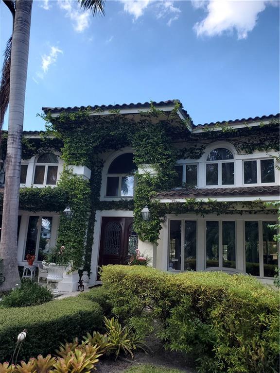 This rare point lot on Nurmi Isles has 295' water frontage, 145' faces north on a 300' wide canal and 150' faces west on a 120' wide canal. The house needs a major remodel or can be removed for new constructiom. The street has underground utilities and natural gas is available.
