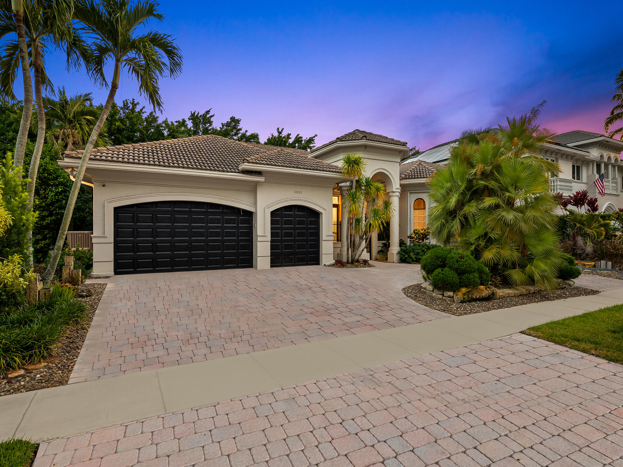 Welcome to Hawks Landing, one of Plantation's premier guard-gated communities. This spacious one-story residence offers 5 bedrooms, 3 bathrooms, and a 3-car garage with nearly 3,000 square feet of living space. Designed for comfortable everyday living, the home features a functional split-bedroom floor plan with generous living areas and abundant natural light. You'll find a built in bar area great for entertaining. Step outside to your private backyard oasis featuring a heated pool, artificial turf, lush tropical landscaping, a removable child safety fence, and a built-in BBQ—perfect for entertaining, relaxing, and enjoying South Florida living year-round. An excellent opportunity to personalize a well-maintained home in one of the area's most sought-after guard gated neighborhoods.