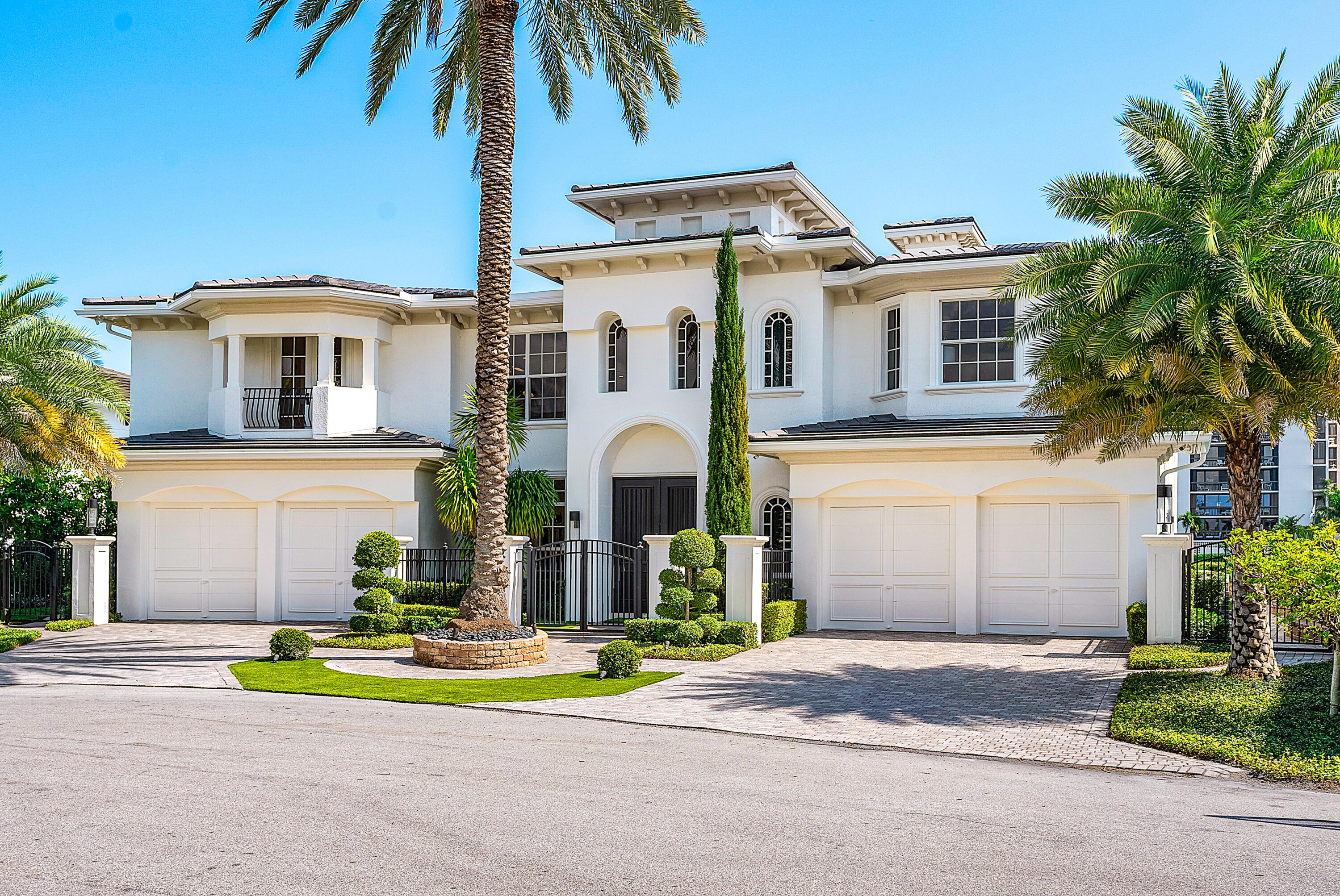 Nestled on a prime waterfront location in Boca Raton, 794 Ne Harbour Drive is an elegant and contemporary estate that exudes luxury and sophistication. With a complete remodel that showcases designer finishes, this stunning home boasts impeccable attention to detail and exquisite craftsmanship throughout!

As you enter, you'll be greeted by soaring ceilings and breathtaking water views that extend throughout the living areas. The open concept floor plan seamlessly blends indoor and outdoor living, offering expansive vistas from every room. The first floor features a waterfront office, a full guest suite, a 6-seat movie theater, and a bar perfectly situated for entertaining guests.

Step outside, and you'll find an oasis of relaxation in the backyard, where 100ft of water frontage offer long waterway views, southern exposure to nature preserves, and The Boca Raton Tower. The spacious pool is complemented by a generously sized spa and elegant marble decking, creating a seamless connection between the seawall and backyard.

Take the private elevator to the second floor, where you'll find a second-story gallery foyer leading to the primary suite. Privately positioned on the north end of the property, this lavish suite offers some of the widest intracoastal views in Boca Raton, enjoyed from a private balcony. The oversized primary bathroom features book-matched porcelain walls, while a morning bar and owner's retreat offer an inviting space to relax and soak in the views. The second floor also features two additional guest bedrooms with ensuite bathrooms and a VIP guest suite with a private terrace.

The home's structural components are equally impressive, with a brand-new roof from 2023, impact glass, a whole-home generator, and a 4-car garage. With 7819 SQFT under roof, this waterfront gem offers an exceptional opportunity to purchase a completely remodeled home that seamlessly blends functionality, beauty, and sophistication in Boca Raton.