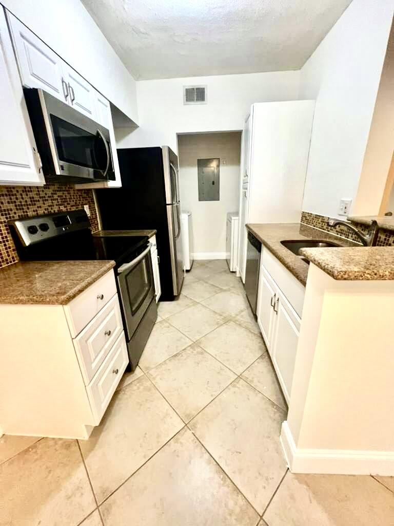 SPA AT SUNSET ISLES CONDO - Residential Lease