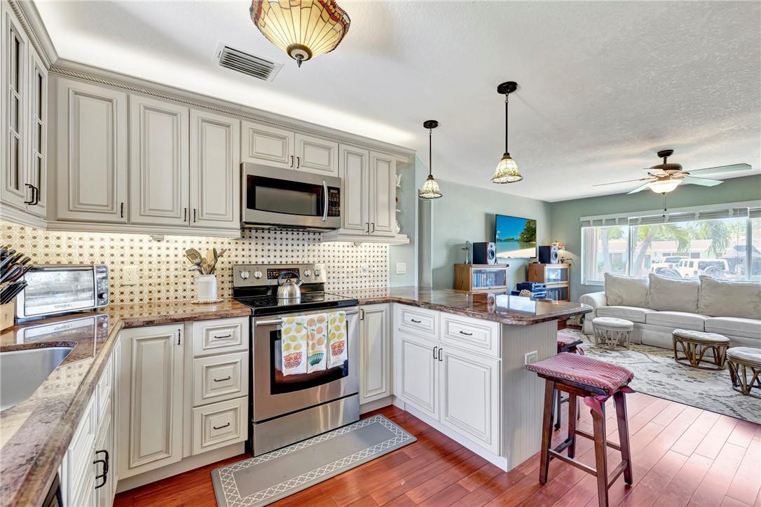 Opportunity awaits you! Lowest priced single family east of Federal in Pompano Beach and only minutes to beach. This cozy two bedroom/one bath home is perfect for someone to be in this location at a very low price point. No HOA or restrictions. Need more space or want to build instant equity, add a bedroom, bath, and/or pool. Updated open kitchen with granite and stainless-steel appliances. Beautiful bamboo flooring throughout, knock down ceilings, 2011 AC and Hot water heater, updated electrical panel, 2009 roof and screened in back patio.  Fenced back yard with room to park boat/trailer on side of house behind double gate. Large 10’ X 14’ shed w/shelving and work bench. All updates/additions permitted. About the AreaEnjoy daily walks to beach – which is only 1.5 miles away. ¬ This beautiful home is conveniently located near shopping, restaurants, golf and parks. Have fun going to the Pompano Beach Fishing Village to dine at Oceanic, Lucky Fish, or Beach House and then take a stroll on the Fisher Family Pier. For you boat lovers, the boat ramps are literally five minutes to Alsdorf Park which is only minutes away from the inlet. What a GREAT place to call home!!!