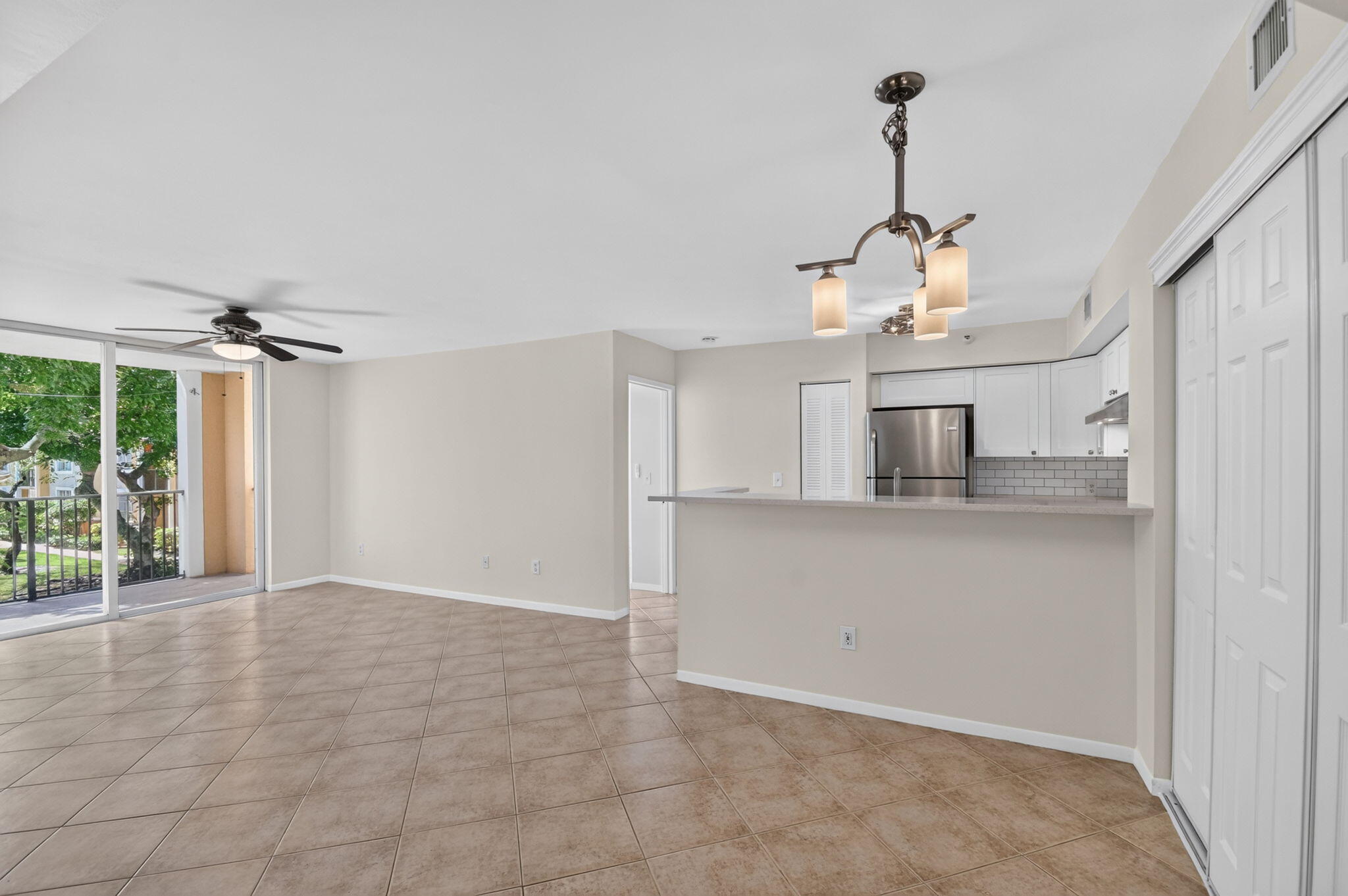 Ready to live like you're on vacation? Don't miss this beautifully remodeled 2-bedroom, 2-bath split-floorplan condo offering exceptional value in Palm Beach County. Located on the second floor with peaceful green space views and just steps from the community's second pool, this move-in-ready condo includes cable, water, and internet. Thoughtfully designed with abundant storage, new fixtures throughout, and a stunning kitchen featuring new cabinetry, quartz countertops, a modern backsplash, and updated sink. Enjoy refreshing Intracoastal breezes from one of the community's most desirable locations along the widest section of the Intracoastal. Freshly painted and meticulously maintained, this home is ready for you to start your next chapter.