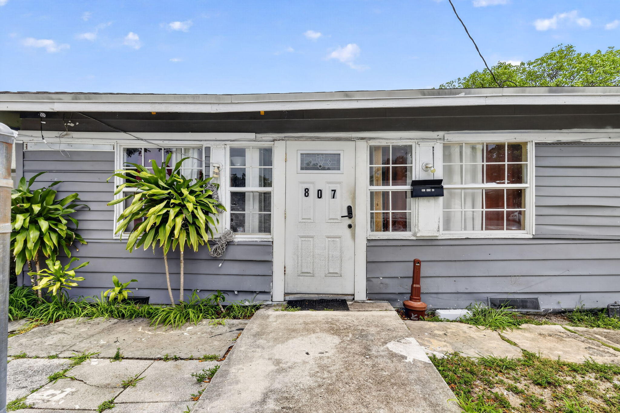 Great investment opportunity in West Palm Beach !  Clean, well maintained units all on separate electric and water meters.  Central AC replaced in the past 3 years.   No restrictions.  Perfect opportinity for an investor or multi family purchase venture.  Call today and make an appointment to see! This one won't last!