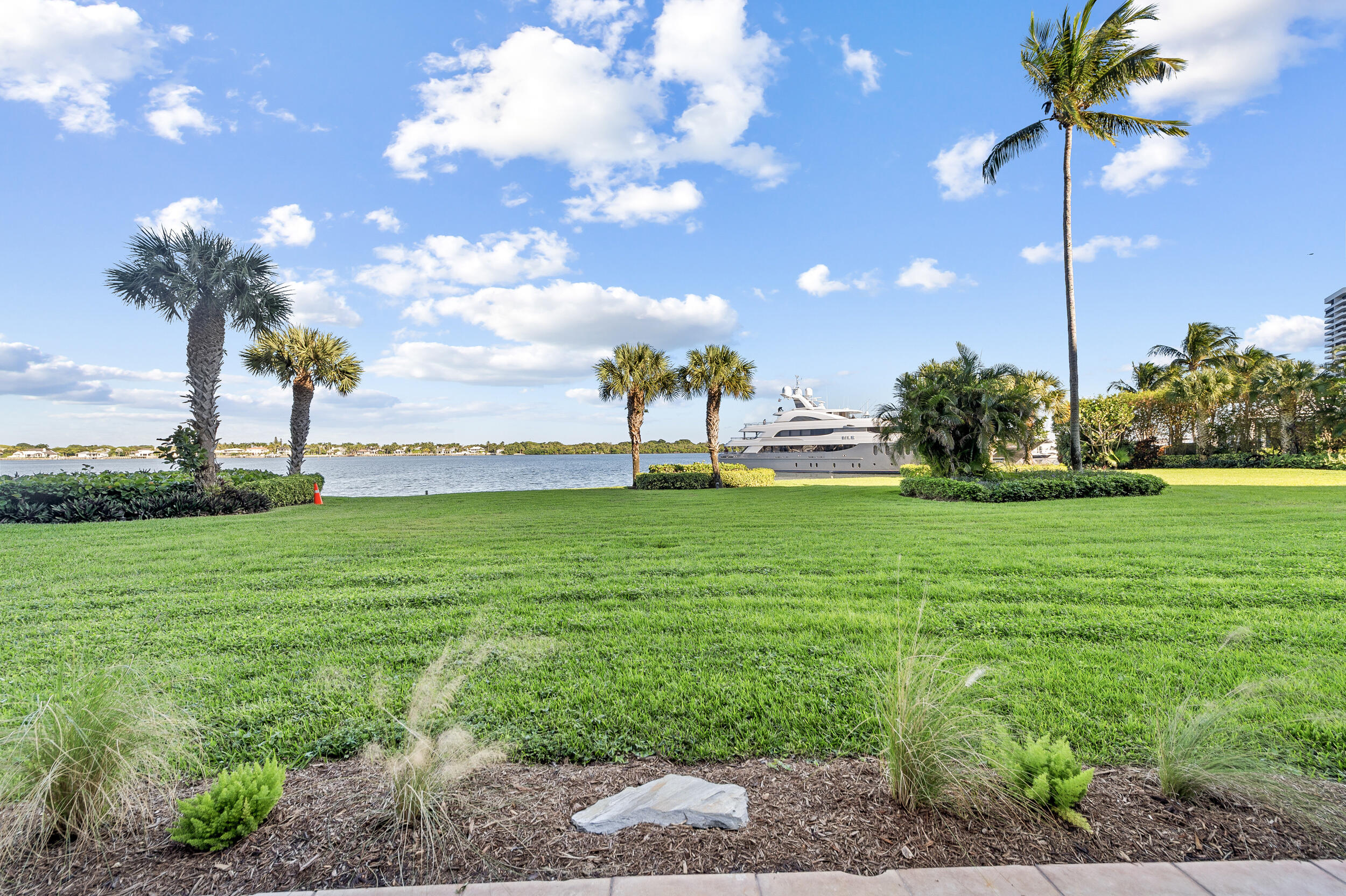 Experience the pinnacle of coastal living in this newly renovated unit. This exceptional home boasts a unique floor plan—the only one of its kind in Old Port Cove. With 2 bedrooms & 2 bathrooms, this residence offers a generous layout that enhances the sense of openness. Step inside to discover a haven of modern comfort, featuring an enclosed private atrium. Every detail of this renovation was considered right down to the unique hardware. All exterior doors & windows are impact rated. The laundry room is conveniently located inside & provides additional storage space along with the expansive walk-in master closet & private hallway storage closet.  Best of all, enjoy breathtaking intracoastal views the moment that you enter the condo. Soak in even more from the outdoor patio! Beyond the confines of your home, indulge in a suite of luxurious amenities. The building offers a manned gate for added security, and a gym to support your active lifestyle. Dive into the refreshing pool, host gatherings in the common media/recreation room, or challenge friends in the game room.  This high-rise community also includes an on-site restaurant for dining convenience, while garage parking and onsite property management add layers of ease to your daily routine. Pets are considered, if under 25 lbs. Embrace a vibrant waterfront lifestyle with the added benefits of marina access, ensuring every day feels like a vacation in paradise. Don't miss the chance to call this extraordinary unit your home.