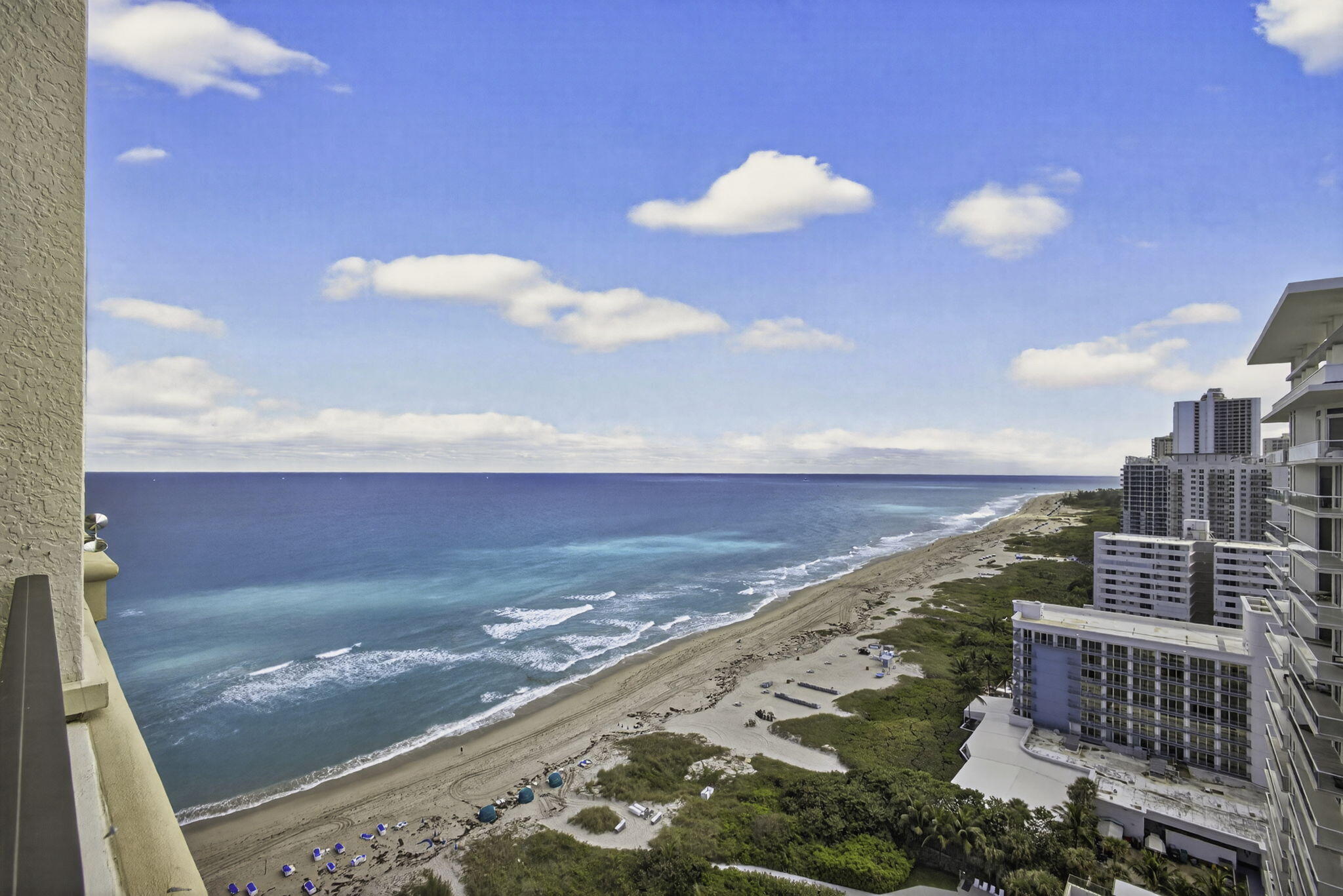 Located at the Palm Beach Marriott Singer Island Beach Resort & Spa, this beautifully renovated 3-bedroom, 3.5-bath residence is offered at $2,450,000 and delivers true luxury resort living. Perched on the 20th floor with desirable southeast exposure, the condo features an expansive terrace with unobstructed views of both the Atlantic Ocean and the Intracoastal Waterway, offering spectacular sunrises and sunsets. The kitchen and primary bath have just been updated, and the residence is impeccably decorated and sold fully furnished, making it completely turnkey. A private elevator opens into your personal foyer, and the interior includes marble floors throughout, Sub-Zero and Viking stainless steel appliances, newly installed quartzite countertops, and designer finishes. full resort amenities including beach service, two pools, 3 on-site dining restaurants, a spa, fitness center, theater, and kids' club, delivering exceptional oceanfront living.
