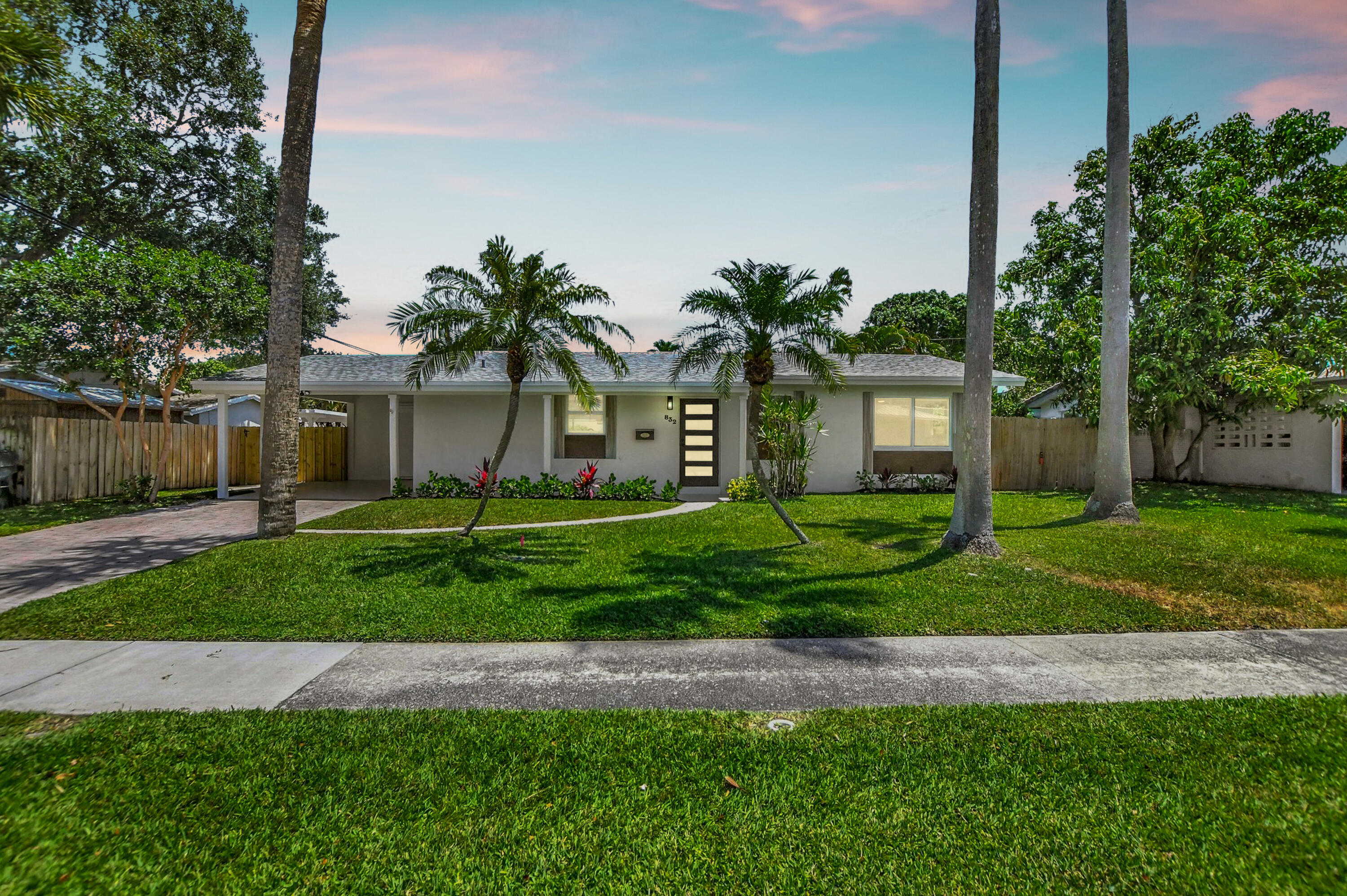 You're Home sweet Home-UNIQUE 2BR,2BA with detached Poolside A/C Office! Luxurious newly renovated comfort, towering palms swaying in a refreshing breeze greet you into your beautiful Open floorplan home with its grand sized pool & uniquely featured bonus detached poolside office/retreat, all in the well desired Boca Square neighborhood. The spacious living area overlooks the perfectly positioned refreshing pool and covered spa like patio, ready for your enjoyment. The open floor plan flows from the well appointed new kitchen into the living and dining areas all with a pool view backdrop. Elegant quartz countertops with 2 tone look fine wood cabinetry & new modern appliances are featured in the kitchen gathering area with peninsular countertop workspace/eat in seating! The naturally well lit master bedroom with poolside view boasts a well appointed luxuriously renovated bathroom and walk in closet. The 2nd bedroom is well positioned just off the elegantly renovated hall bath area. The large fenced in yard with numerous palm trees perfectly surrounds the stellar pool, covered patio and bonus detached poolside office/retreat. Modern LED lighting throughout and uniquely custom featured LED "night light" accent lighting in the kitchen and bathrooms set the mood for a serene peaceful escape in the evenings or early mornings. This perfectly located home is just minutes from the "A rated" new Addison Mizner school, Beaches, Shopping, Fine dining and waterfront Resorts. Entwine yourself in the Boca Raton Florida subtropical lifestyle with this modern updated home for many years to come. House also has a just completed new roof to give you additional secure comfort. Thank you for looking -Home Sweet Home!