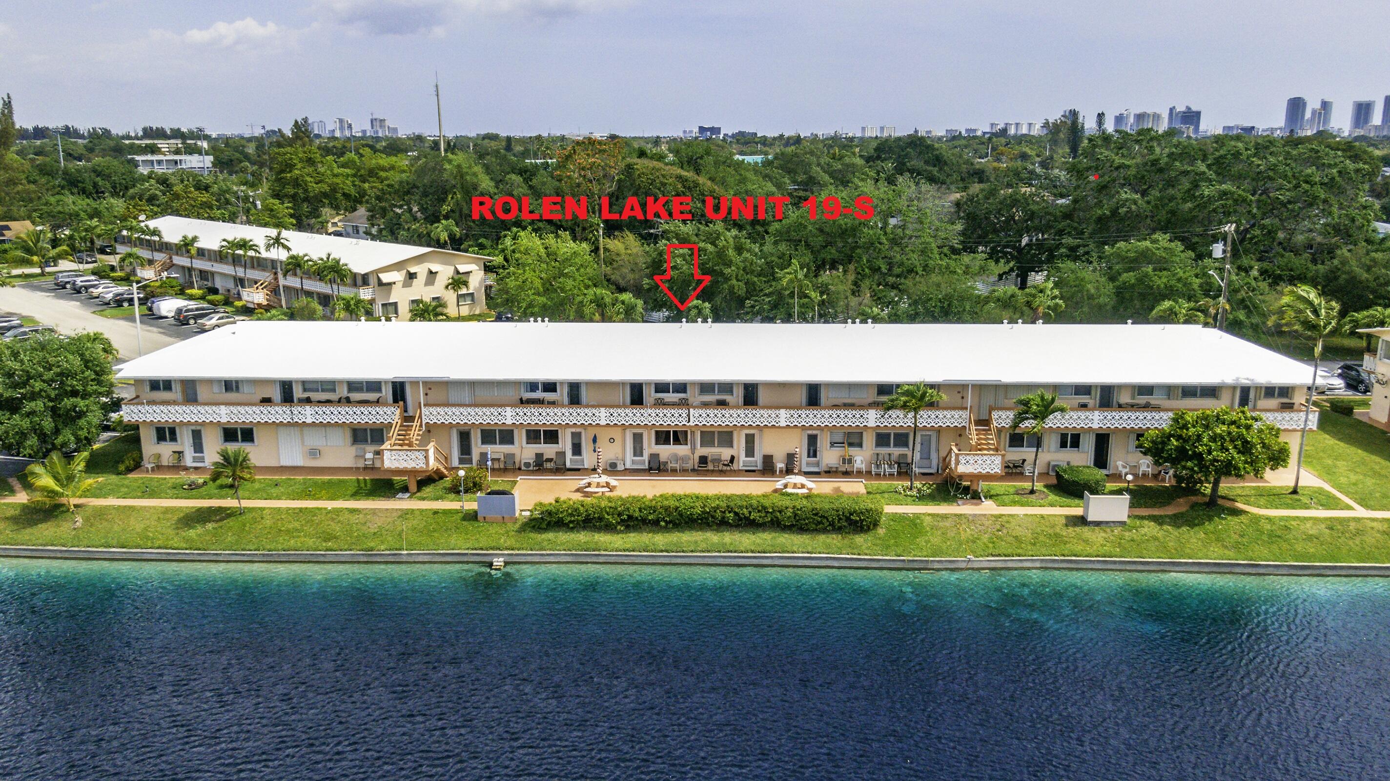 MOVE RIGHT-IN! Spotless unit with GREAT VIEW OF THE LAKE sold FURMISHED TURNKEY! Enjoy the water view with your monrning coffe or your afternoon coaktail on your private terrace. Ne Need to shop,  this unit is very well furnished and everythig stay even the beach chairs! This unit offers new IMPACT WINDOWS AND DOORS just installed in 2025 .  Kichen cabinets have been repaited with newer countertop and white tile backsplash. Clean ceramic tile set diagonally thru-out. Updated ceiling fans and interior dorrs. Bathroom updated with newer vanity, medecine cabinet & toilet. Large pantry inside unit. Bedroom facing the lake with wall to wall closet. Cash only, 55+ community with clubhouse, librairy, small gym, billiard, pool , BBq, shuffleboad and park. Seasonal renting allowed afer one year.    40 YEARS REPAIRS CERTIFICATION DONE!  Building well maintained with updated roof  (2024) and  complete new plumbing done in 2025 under building.    Building with reserves .