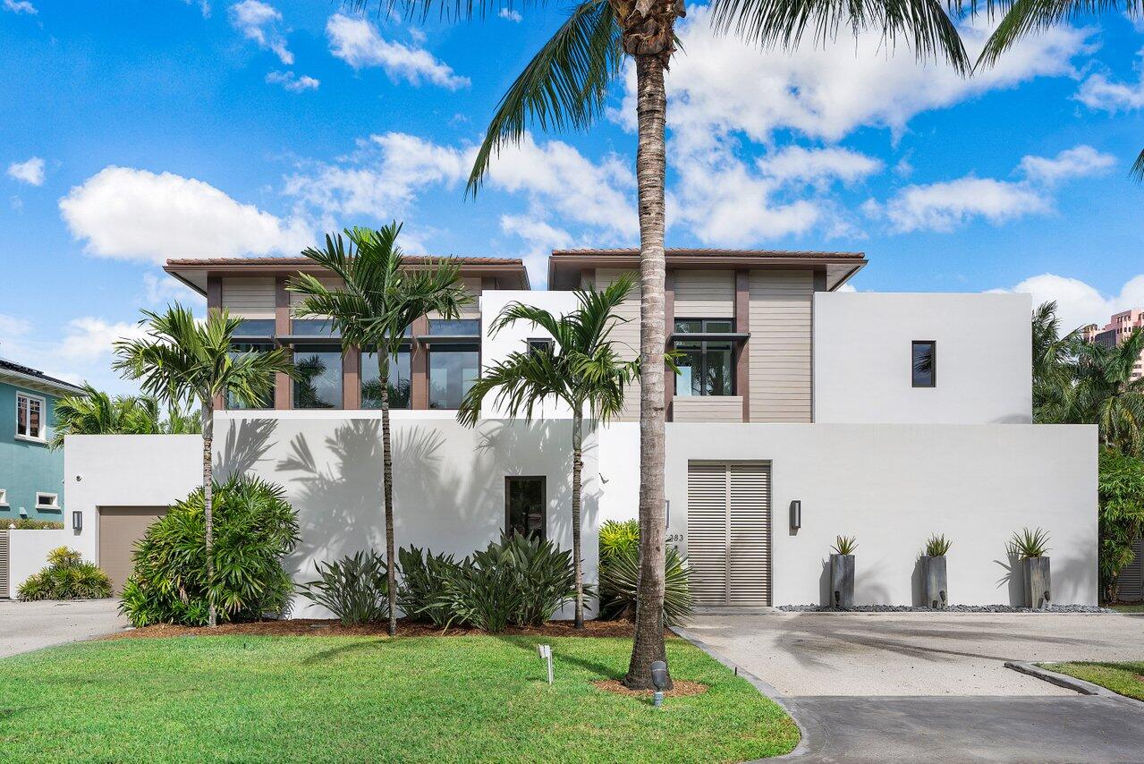 Stunning contemporary custom home by award winning Affiniti Architects & CDC Builders. This ultra private residence sits on an oversized lot & opens to an expansive private courtyard. This home boasts a sprawling open floor plan featuring chef's kitchen, large wine room, expansive master bath with large soaking tub & both a walk in shower with outdoor shower. The clubroom is situated across the courtyard, adjacent from the impressive summer kitchen &  large private pool. Other features include pocket sliding doors across the clubroom & main living area, a garage for 3 cars, Bocce court , custom interior & exterior lighting, & large VIP suite on the second floor. This home is also outfitted with a state of the art smart home system. Truly one of the most unique homes in Royal Palm Clubroom would serve as the 4th bedroom if needed.
