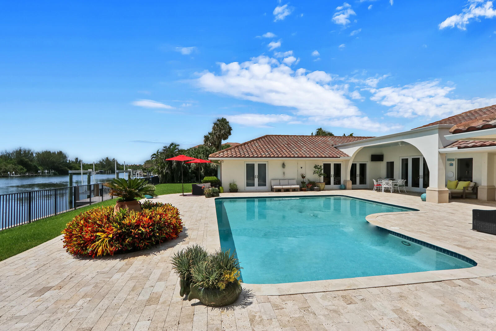 Extensive Intracoastal views with 153 feet of water frontage in the most private area of Manalapan. One story residence with ample spaces and open layout featuring
three plus bedrooms (can be four), three and one half baths, pool, and boat lift. Sitting on over half of an acre this home has deeded access to the 
beach and membership to La Coquille Club at 
the oceanfront Eau Palm Beach Resort Hotel.