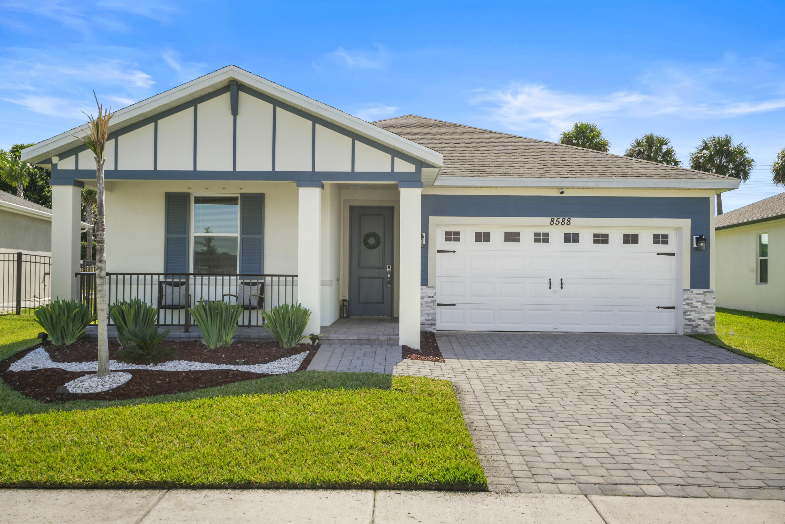Welcome to this like-new 2024 single-family home located at 8588 Dahlia Circle in Port St. Lucie. This beautifully maintained 4-bedroom, 2-bath home offers 1,916 sq. ft. of living space with a bright and functional layout, ceramic tile flooring, CBS construction, and modern finishes throughout. Built in 2024 and lightly lived in, this home gives buyers the feel of new construction without the wait. Enjoy a spacious lot, attached garage, and a desirable location in a growing community with a very low HOA. Move-in ready and perfect for buyers looking for comfort, style, and value.