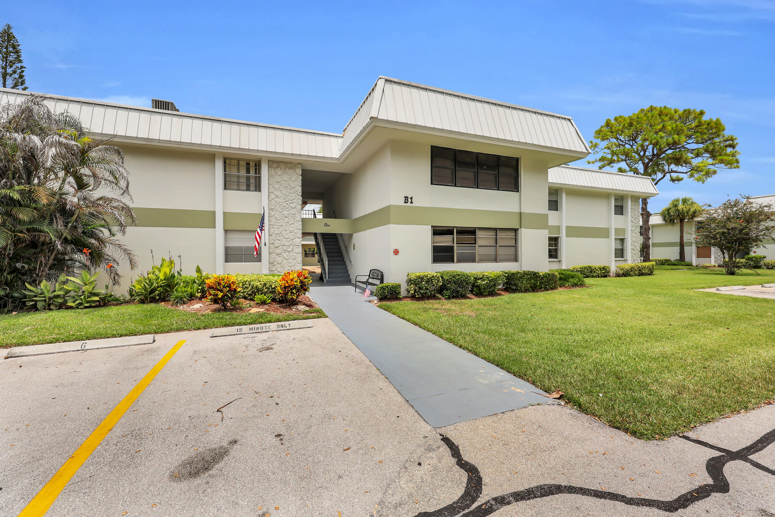 Experience easy, low-maintenance Florida living in this beautifully maintained second-floor condominium located in the desirable Inlet House, an active 55+ community in Fort Pierce.  This move-in-ready 2-bedroom, 1-bath residence offers the perfect blend of comfort, convenience, and affordability for year-round residents or seasonal snowbirds.  Inside, you'll find decorative tile flooring throughout the main living areas, new kitchen flooring, beautiful kitchen cabinetry, a brand-new GE range, Bosch dishwasher, and a bright, functional layout that flows into the spacious living and dining areas. Sliding glass doors lead to a screened and enclosed patio, creating the perfect space to enjoy your morning coffee or unwind in the evenings while taking in the peaceful surroundings.  Major updates have already been completed for added peace of mind, including a new air conditioning system, new water heater, and the community has recently received a new roof, fresh exterior paint, and beautifully refreshed landscaping. Residents enjoy a large screened community pool, updated clubhouse, shuffleboard courts, a quiet courtyard setting, common laundry just steps from the front door, and assigned off-street parking.  Ideally located near the corner of Virginia Avenue and Sunrise Boulevard, this home is just a short walk to Publix, medical offices, shopping, and dining, only five minutes from historic downtown Fort Pierce and approximately fifteen minutes from the beautiful beaches of Hutchinson Island.  Whether you're looking to downsize, simplify your lifestyle, or enjoy an affordable Florida retreat, this well-maintained condo offers exceptional value in one of Fort Pierce's most convenient locations.