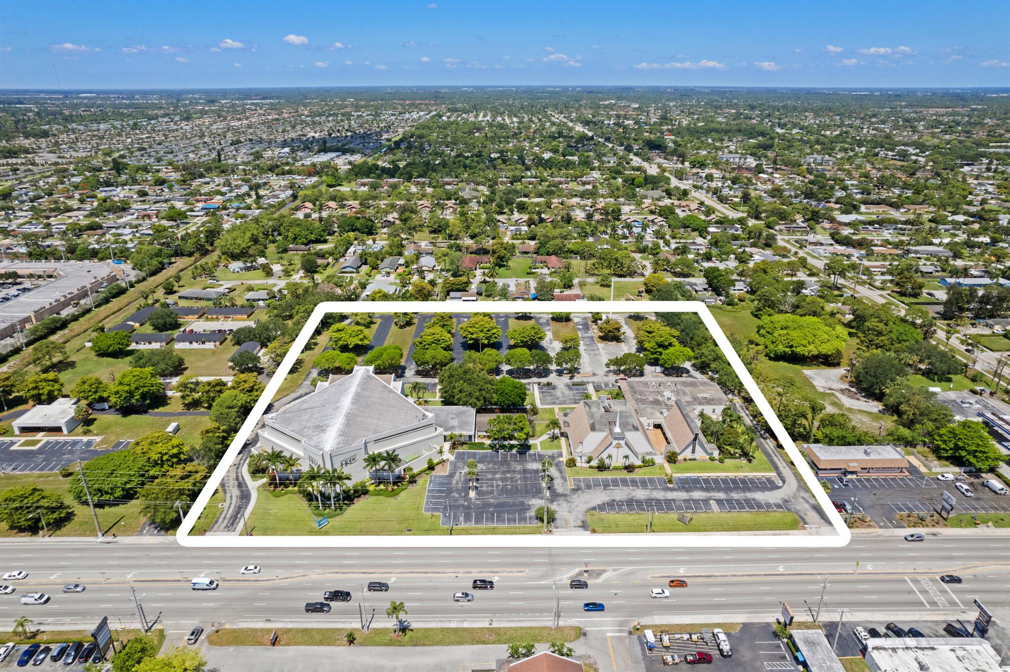 Presenting a rare and exceptional opportunity to acquire 8.6 acres of prime real estate in the heart of West Palm Beach. This property, historically utilized as a place of worship, offers a wide range of re-development opportunities in addition to continued use as a house of worship. Located on S Military trail with AADT of 42,500 per day. Flexible Urban Infill
Zoning allows for multiple permitted future uses such as multifamily, townhomes, retail, office, and hospitality. No industrial permitted.