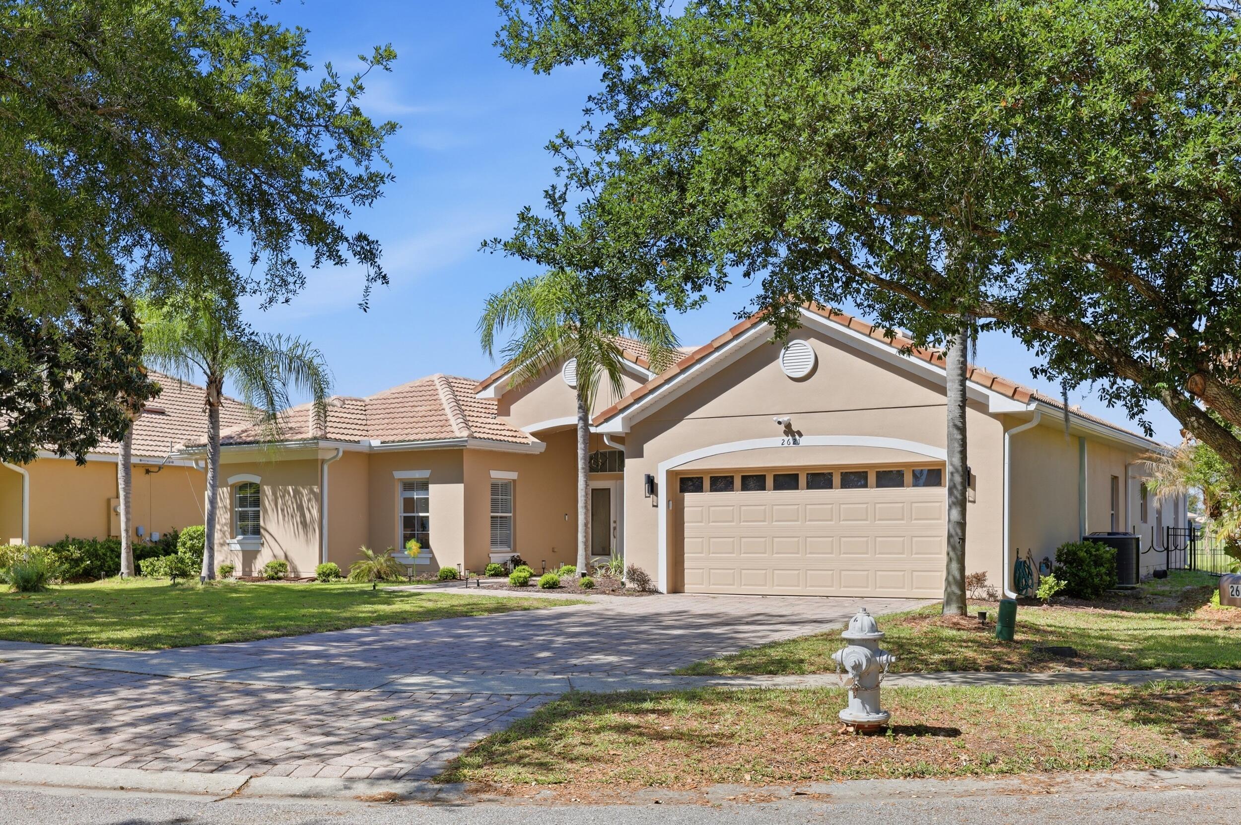 Welcome to luxury living on a private cul-de-sac in one of the area's most sought-after communities. This move-in ready home features numerous upgrades, including new roof, water heater, new lighting, ceiling fans, appliances (refrigerator, microwave, washer & dryer), and a renovated laundry room with custom cabinetry. A versatile flex room can serve as an office or additional bedroom. Enjoy outdoor living with a panoramic screened enclosure, new lanai, extended patio, and fenced yard. Smart home features include a doorbell camera, floodlight security, and upgraded garage system. HOA amenities offer resort-style living with clubhouses, pools, fitness centers, sports courts, waterfront dining, lake access, and a scenic 5-mile trail. Community also is home to a school, Bellalago Academy