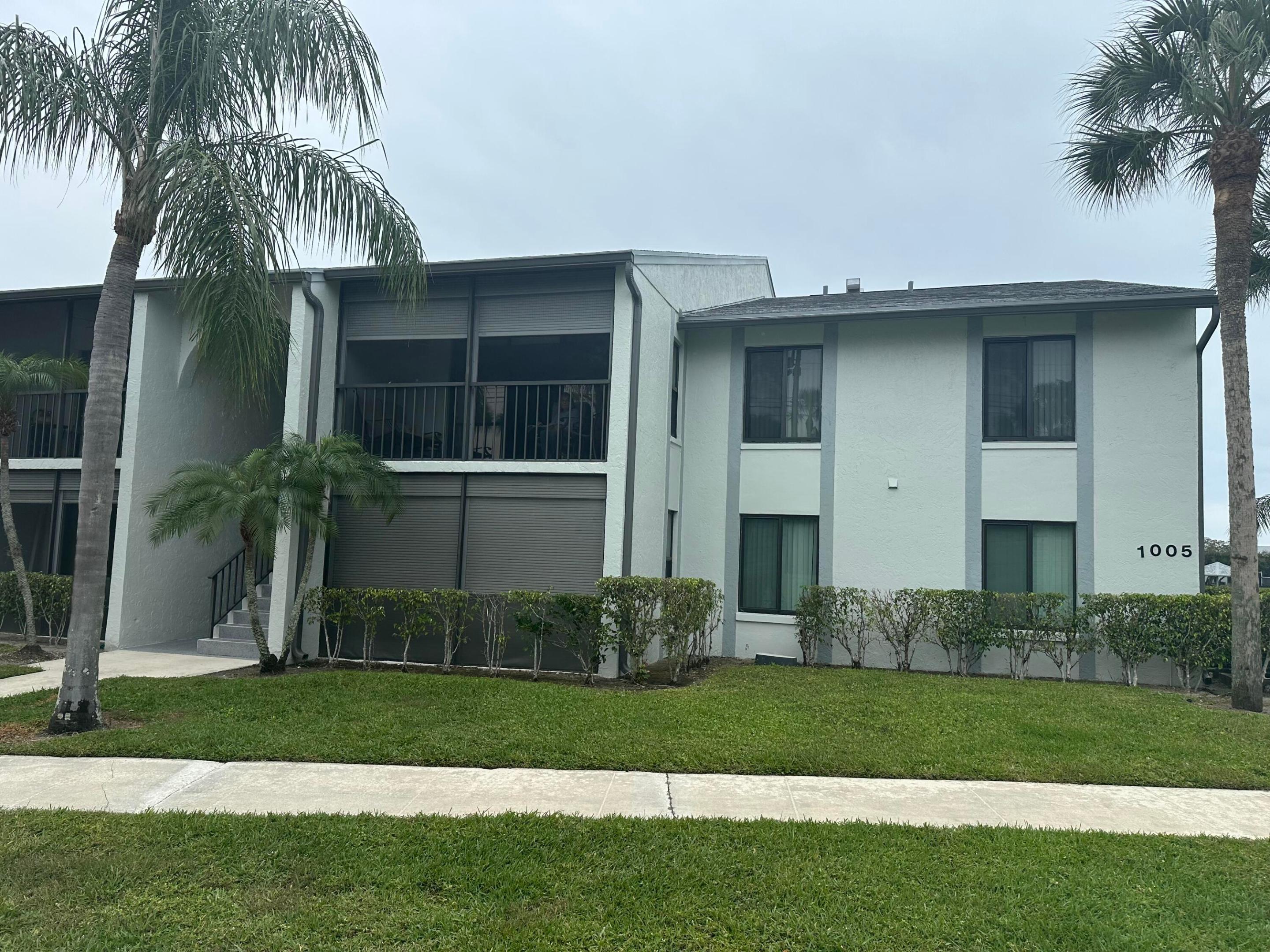 This corner unit, located on the 2nd floor, boasts impact glass windows, as well as Roll Down shutters on the balcony.  Newer appliances and bathroom touches and tinted sliding glass doors.  Palm Club Village offers sidewalks, bike-jog trail, pool & clubhouse, tennis, a community room, and picnic area.  convenient to downtown, major transportation and... the CACTI Park, home to the Braves Spring Training stadium!