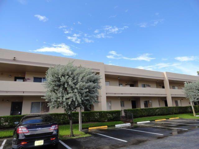 BRIGHT AND SPACIOUS second floor condo, tiled throughout, renovated kitchen and bathrooms, washer & dryer in unit, large screened patio overlooking the pool. Poinciana Gardens, a 55+ Community offers outstanding country club amenities, swimming pool, tennis, pay-as-you-play golf , movies, Arts & crafts, lectures, gym, yoga, lots of friendships waiting for you. Enjoy "Mel's" restaurant at the Clubhouse for lunch or dinner. Water included. Water, Cable and Internet are included in HOA. Children over 12 years old are accepted.  Second vehicle can park in guest parking. Only 2 vehicles allowed.