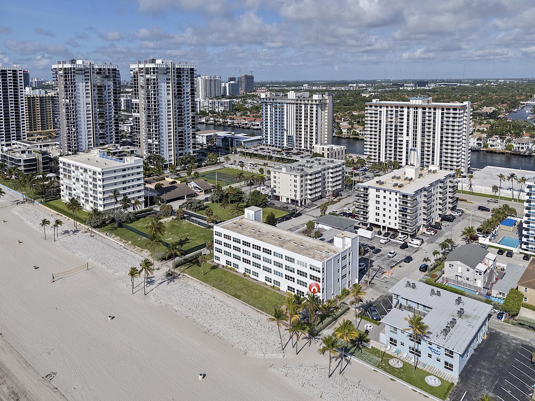 Direct Ocean Views! Rarely available corner unit in an elevator building featuring impact windows and doors, porcelain tile throughout, all new appliances, HVAC 3 years new, oversized bedroom, custom shower, in-unit washer and Miele dryer, and Hunter Douglas custom shades. Enjoy direct beach and boardwalk access, a renovated lobby, updated social areas, pool, bike storage, assigned parking plus guest parking, and a fantastic location just 15 minutes from Fort Lauderdale Airport. No leasing permitted during the first two years of ownership. Thereafter, rentals are permitted for a maximum of 120 days. Easy to show with 24-hour courtesy notice.