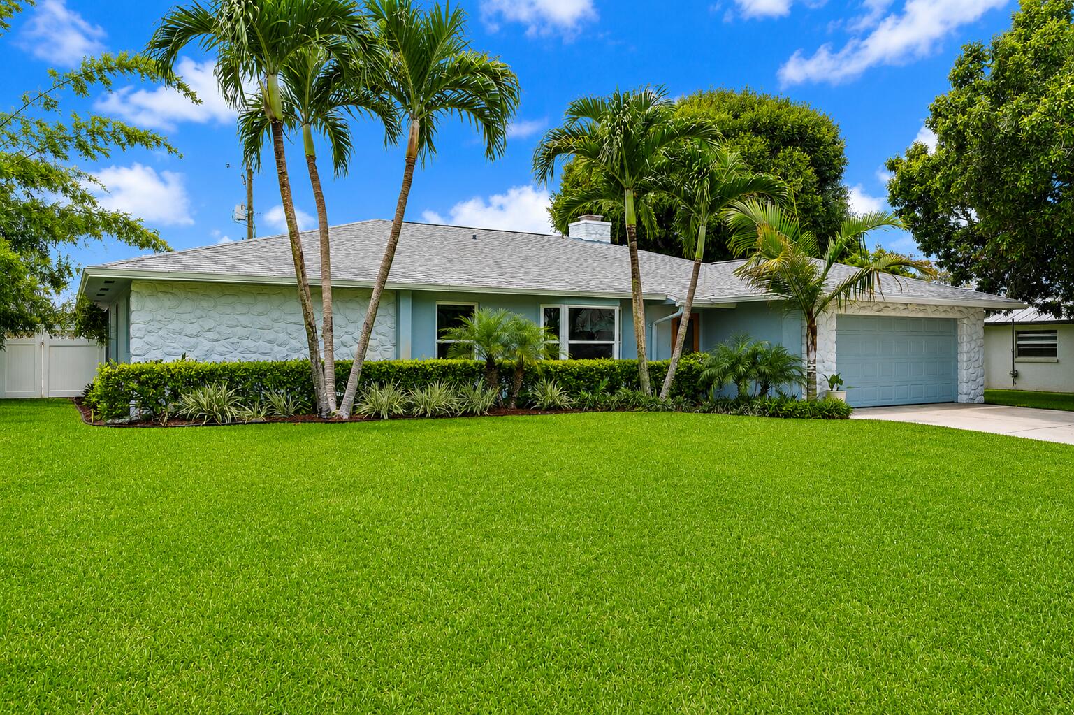 Welcome home to Tequesta Pines, one of Tequesta's most sought after neighborhoods, where tree-lined streets, friendly neighbors, and an unbeatable location create the perfect place to call home. This beautifully maintained CBS-built 3-bedroom, 2-bath pool home offers 1,792 square feet of comfortable living space, with all the major improvements already completed for you. Enjoy the confidence of impact windows and sliding doors, a 2025 HVAC system, 2026 water heater, 2018 roof, and a new washer and dryer (2025)—allowing you to focus on just enjoying your new home! Inside, the thoughtfully designed split-bedroom floor plan provides privacy for guests, while the updated kitchen opens seamlessly to the spacious family room, creating the perfect space for everyday living and  entertaining. A charming wood-burning fireplace serves as the heart of the home, adding warmth and character throughout the seasons.  Step outside to your own private oasis, where a screen-enclosed pool and fully fenced backyard offer the ideal setting for weekend barbecues, relaxing afternoons, and plenty of room for children and pets to play.  Located just minutes from Jupiter Island's pristine beaches, waterfront dining, boutique shopping, marinas, parks, and top-rated schools, Tequesta Pines is a community where neighbors become friends and the South Florida lifestyle is right outside your door.  If you've been searching for a move-in-ready home with quality construction, major system updates, and an exceptional location, this Tequesta Pines gem is ready to welcome you home.