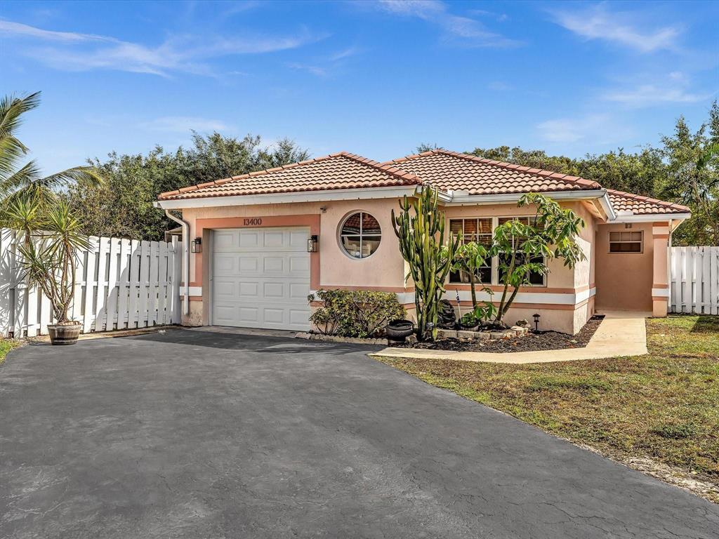 DISCOVER THIS BEAUTIFULLY MAINTAINED 3-BEDROOM, 2-BATH HOME IN HIGHLY DESIRABLE SAWGRASS PLANTATION! THIS MOVE-IN READY PROPERTY FEATURES A NEW AC, NEW HURRICANE IMPACT GARAGE DOOR, AND NEW APPLIANCES, OFFERING BOTH COMFORT AND PEACE OF MIND. THE HOME BOASTS A BRIGHT, OPEN LAYOUT WITH LARGE WINDOWS, UPDATED FINISHES, AND GREAT NATURAL LIGHT THROUGHOUT. SITUATED ON THE BIGGEST CORNER LOT IN THE NEIGHBORHOOD, THIS FULLY REMODELED 3/2 STANDS OUT WITH SPACE AND PRIVACY. ENJOY A BEAUTIFUL LAKEVIEW FROM YOUR SCREENED-IN SWIMMING POOL, CREATING THE PERFECT SETTING FOR RELAXING OR ENTERTAINING. THE EXPANSIVE BACKYARD OFFERS PLENTY OF ROOM FOR GATHERINGS, OUTDOOR LIVING, AND MORE. CONVENIENTLY LOCATED NEAR SAWGRASS MALL, PARKS, DINING, AND MAJOR HIGHWAYS—THIS IS A RARE FIND YOU DON'T WANT TO MISS!