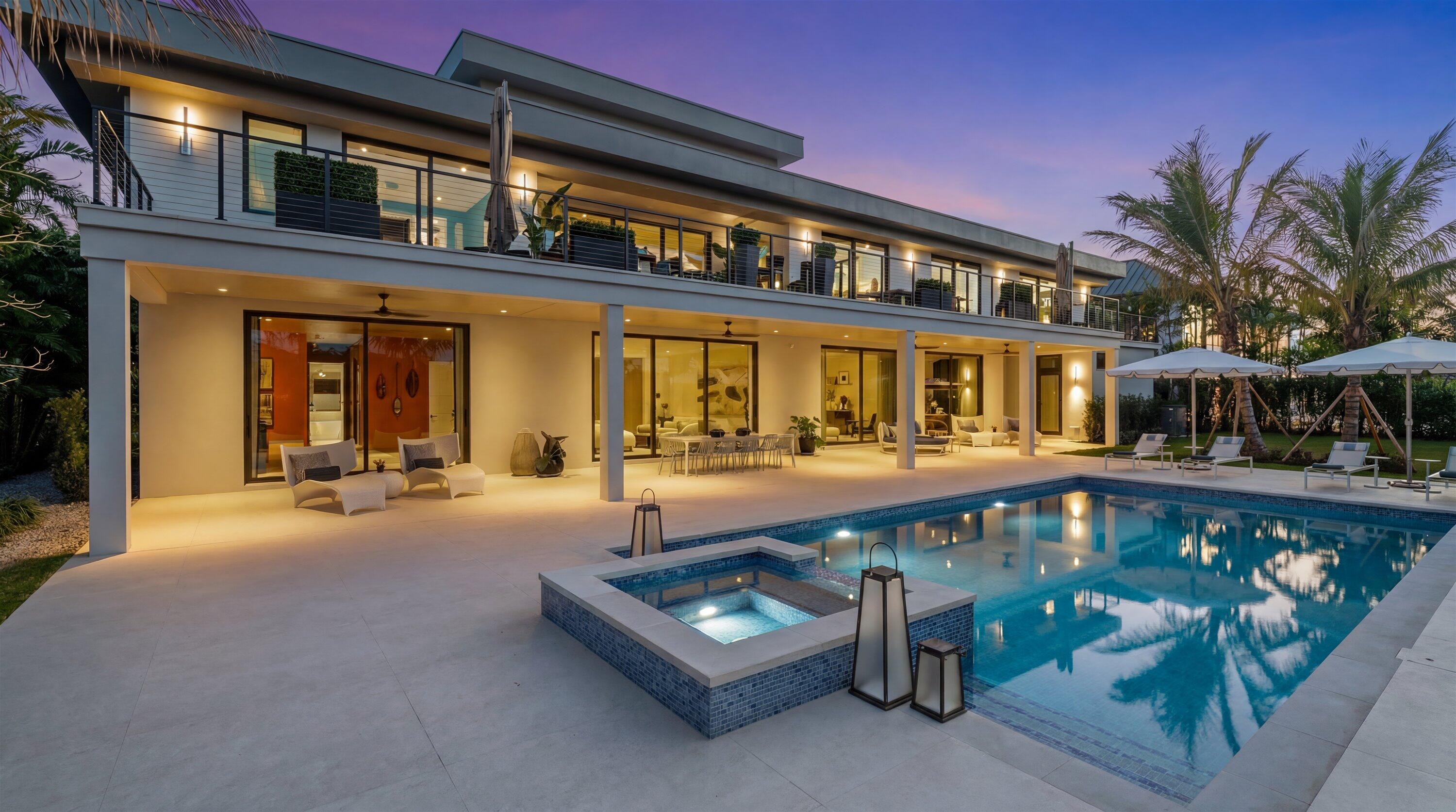 Welcome to Farrell Estates, an exclusive 27-home enclave within the prestigious Palm Beach Polo Club. This beautiful new construction is built to the absolute highest standards, showcasing exceptional craftsmanship and exquisite finishes throughout. Lot 21 stands proudly with over 7,700 sq ft of living space, featuring striking architecture by Granoff Architects and Will Minnear. This stunning 2-story residence is truly an entertainer's dream. Thoughtfully designed with two primary suites and four additional guest bedrooms, each with ensuite bathrooms and an individually zoned A/C, the home offers both comfort and privacy. An upstairs game room serves as a central gathering space, perfect for bringing everyone together.  A dedicated office, 4-car garage, and laundry rooms on both levels enhance everyday convenience and functionality.  In-home elevator further elevates ease and accessibility. The kitchen is a true chef's dream, featuring top-of-the-line Thermador appliances throughout, including both gas and electric ovens, two dishwashers, an ice maker and a wine cooler. Stunning marble countertops and backsplash make this space as beautiful as it is functional. Impressive floor-to-ceiling windows and doors flood the home with natural light, while warm oak flooring flows seamlessly throughout the interiors. The open-concept living and dining areas are complemented by a cozy lounge space, offering the perfect balance for both entertaining and everyday living. Outside, an expansive 1000+ sq ft patio with a pool and spa captures the essence of Hamptons-style luxury, blending indoor and outdoor living. Lush, mature landscaping surrounds the home and community, creating a serene and private setting. A refined expression of luxury living, offering comfort, style, and effortless elegance at every turn. While the development is still  underway, this home sits proudly between two completed residences, offering immediate enjoyment.  DISCLAIMER: All information provided to you regarding this Property by listing agent and her associates has been obtained from third parties such as the Multiple Listing Service, public records and other sources. All Buyers should independently verify all information provided regarding this Property. The Seller, listing agent and broker make no representation as to the accuracy of this information. The Seller, Realtor and Listing broker make no representation as to the accuracy of this information.