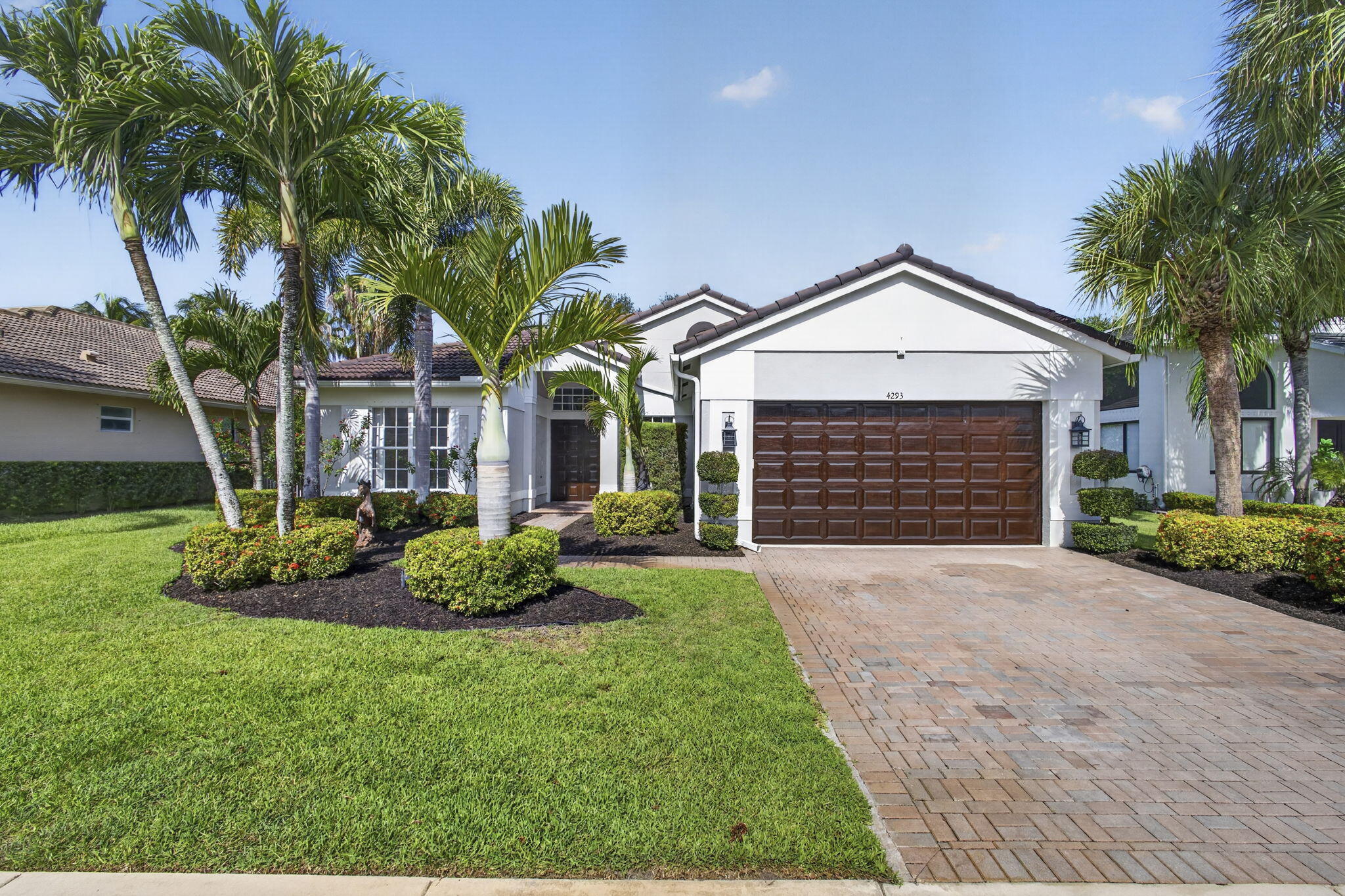 Fully Remodeled 5 bedroom 3 bathroom home in The Isles at Wellington! In like new, move in condition. All flooring is high end porcelain tile including full bathroom walls. Everything in this home was tastefully chosen and designed for full luxury living. All bathrooms are fully porcelain tiled. All new light fixtures and fans throughout. An updated kitchen with premium backsplash. The home also features a covered patio with great yard and the garage is a flex space for entertainment. Full amenity clubhouse & 24hr manned gate in this sought after community in Wellington!