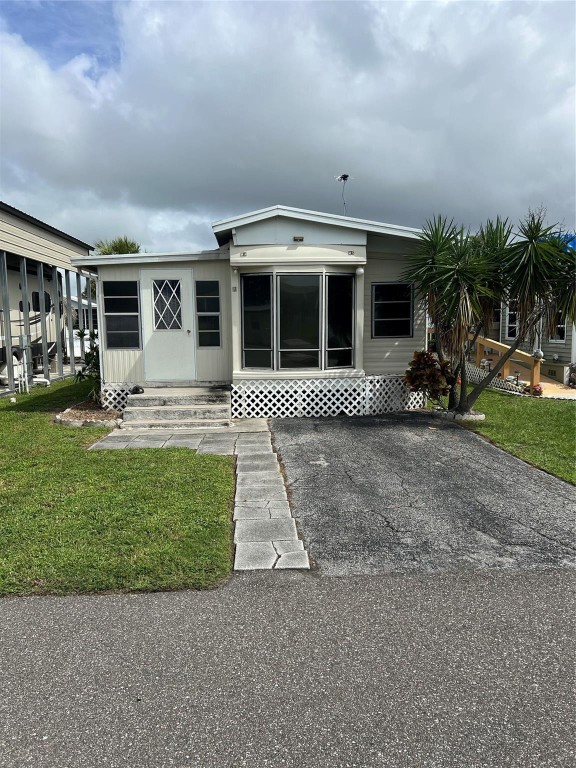 ~Turtle Cove~ Active 55+ Community! Enjoy true Florida waterfront living in this fully furnished 1-Bedroom, 1-bath condo association located on the Rim Canal to Lake Okeechobee. This charming unit features an in-unit new washer and dryer, making it perfect for convenient full-time or seasonal living. AC is 4 years old. Step outside and take advantage of private boat launch, allowing you to bring your boat right to your home- ideal for fishing, cruising, or enjoying Okeechobee waterways. This community offers a spacious 2,000 sq. ft. clubhouse, perfect for social gatherings and relaxing with neighbors in this friendly active environment. Just bring your suitcase and boat!Newer roof-over installed.