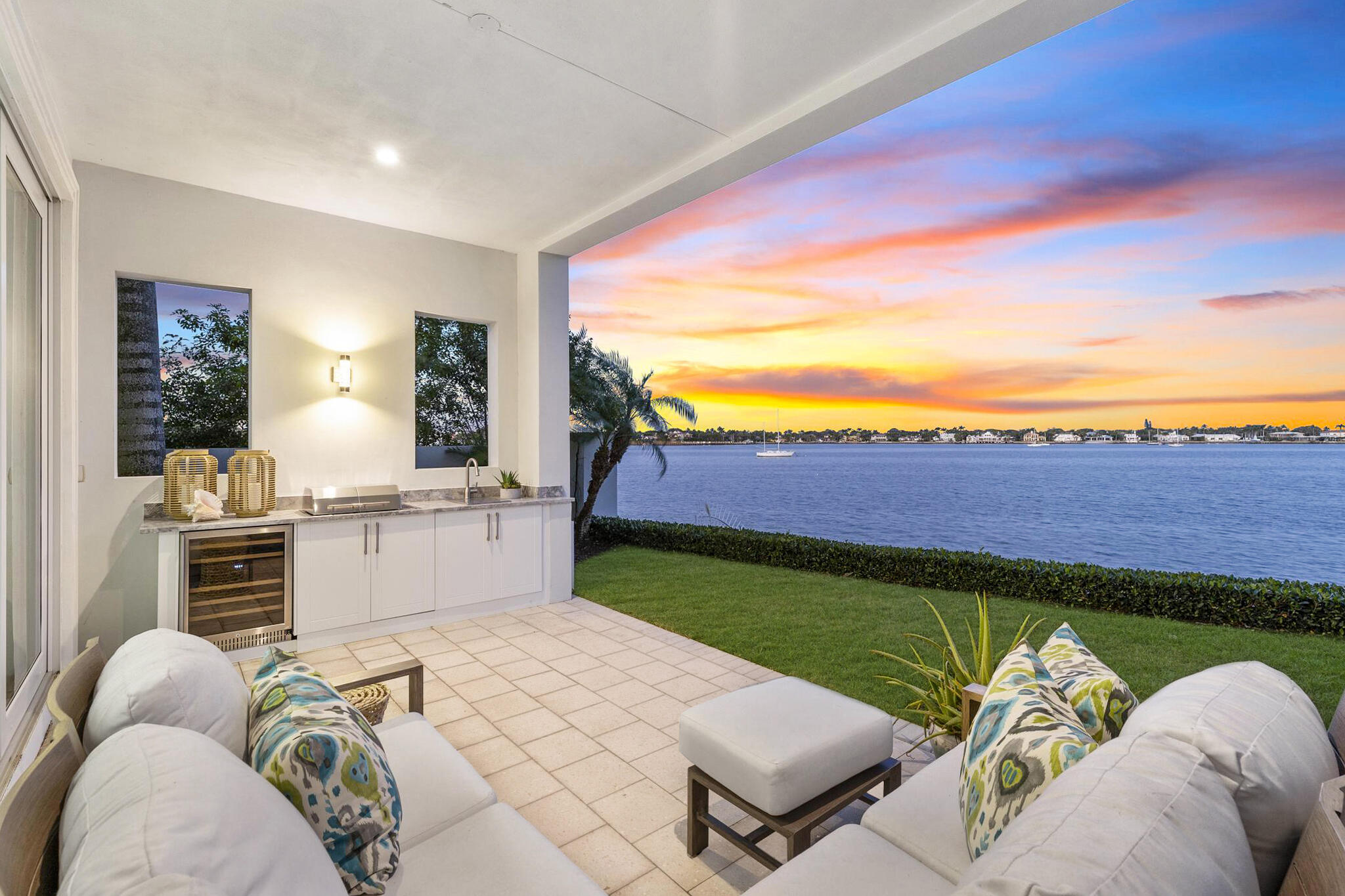 Move-in ready, this waterfront corner villa offers VIEWS, PRIVACY and AMENITIES that will always remain unmatched. Stunning vista of Lake Worth Lagoon to the east and south, beautifully maintained open space to the north, and steps away from resort-style and lap pools, beach cabanas, expansive fitness centers, steam, sauna, PICKLEBALL, PRIVATE MARINA, and more. 3 spacious bedrooms, 3.5 baths, and a 2 car garage harmoniously blend luxury and convenience. Corner location guarantees tremendous privacy and unobstructed views. Pet-friendly community located minutes from the area's best restaurants, GOLF and shopping. Easy access to I-95 and FL Trnpk, PBIA, Palm Beach, West Palm and Jupiter. TRULY SPECTACULAR VIEWS from upstairs and down.