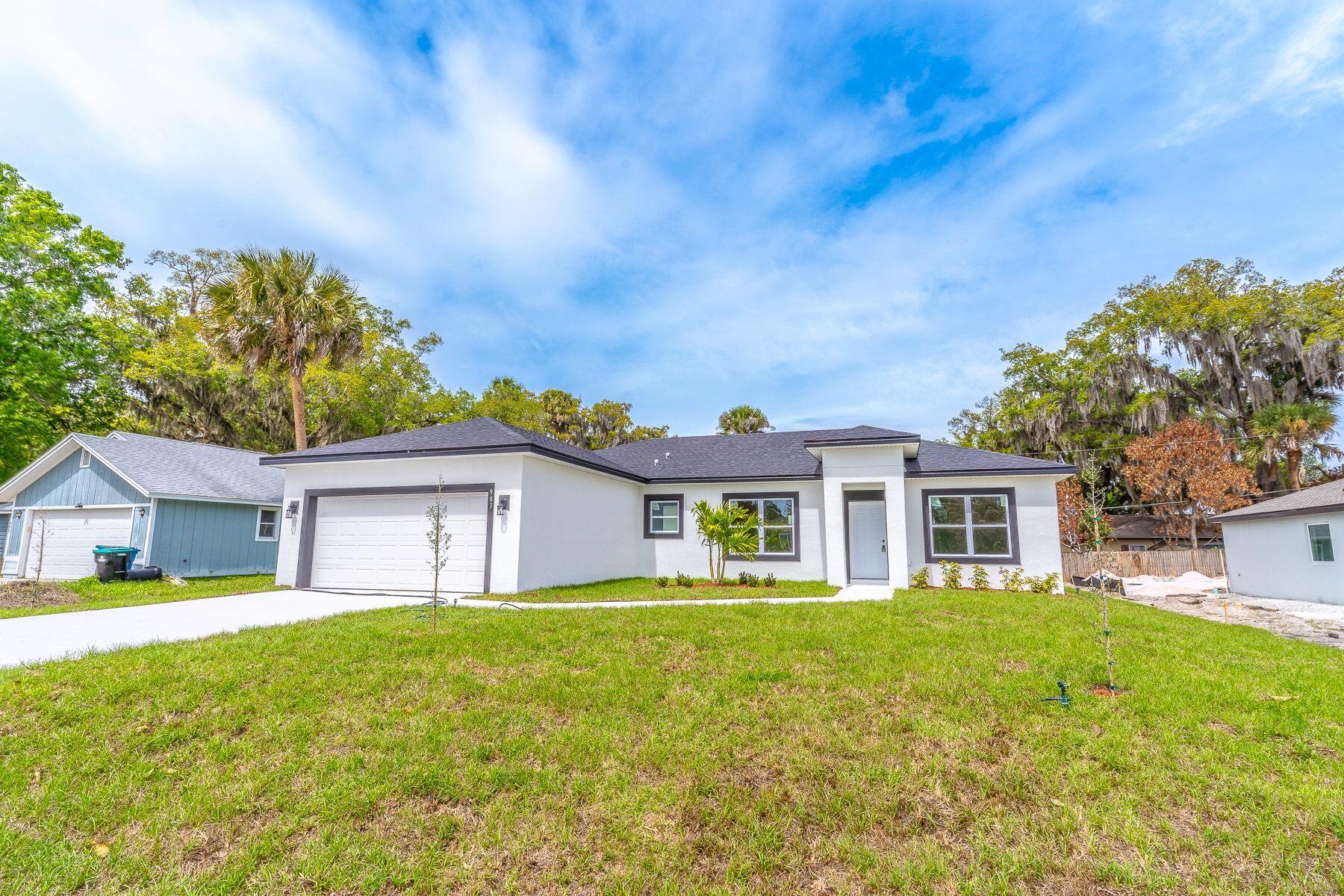 Brand New Palm Bay Beauty. This stunning 4-bedroom, 3-bath home is a total game-changer! With nearly 1,900 sq ft of living space, you get an open and airy floor plan that just flows. The kitchen is a dream - gorgeous waterfall quartz countertop, stainless steel appliances, and wood cabinets that tie it all together. Both the kitchen and baths feature sparkling quartz counters that'll make you smile every morning. Every bedroom gets its own vibe - the primary suite has an ensuite bath, and bedroom 3 has an attached bathroom too. Plus, there's a handy den with built-in closet for that extra flexibility. The perks keep coming! High-efficiency AC, ceramic tile showers that go to the ceiling, a laundry room with its own sink, and a covered balcony perfect for relax.