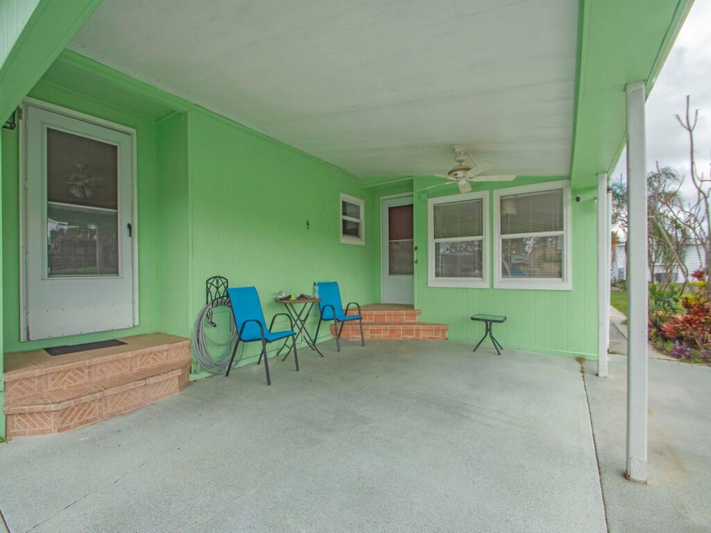 Welcome to 68 W Caribbean in the desirable Spanish Lakes Golf Village, one of the area's most soughtafter 55+ communities. This charming 2-bedroom, 2-bath manufactured home offers a rare blend of comfort and convenience. Truly a standout in the neighborhood. If storage is at the top of your wish list, this is the home for you. It's one of the few properties featuring a double driveway and extensive storage space, eliminating the need for an off-site unit. Inside, you'll find a spacious living area filled with natural light, while the large primary suite includes a walkin closet and a private ensuite bath. Step outside and enjoy peaceful mornings or breezy evenings overlooking the golf course, the perfect backdrop for relaxation.