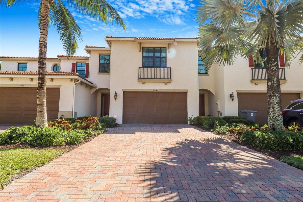 Spacious 2-Story Townhome in Boca Raton featuring 3 Beds, 2.5 Baths. This upscale home features a gourmet kitchen with quartz countertops, a unique island, and premium stainless steel appliances. Spacious living and dining areas open to a covered lanai with a remote roll-out awning. Upgrades include 24x24 porcelain tiles, wrought iron staircase, crown molding, and impact windows. The owner's suite offers dual walk-in closets and a spa-inspired bath with 3 showerheads. Enjoy golf course and lake views, plus access to amenities like a gym and pool.