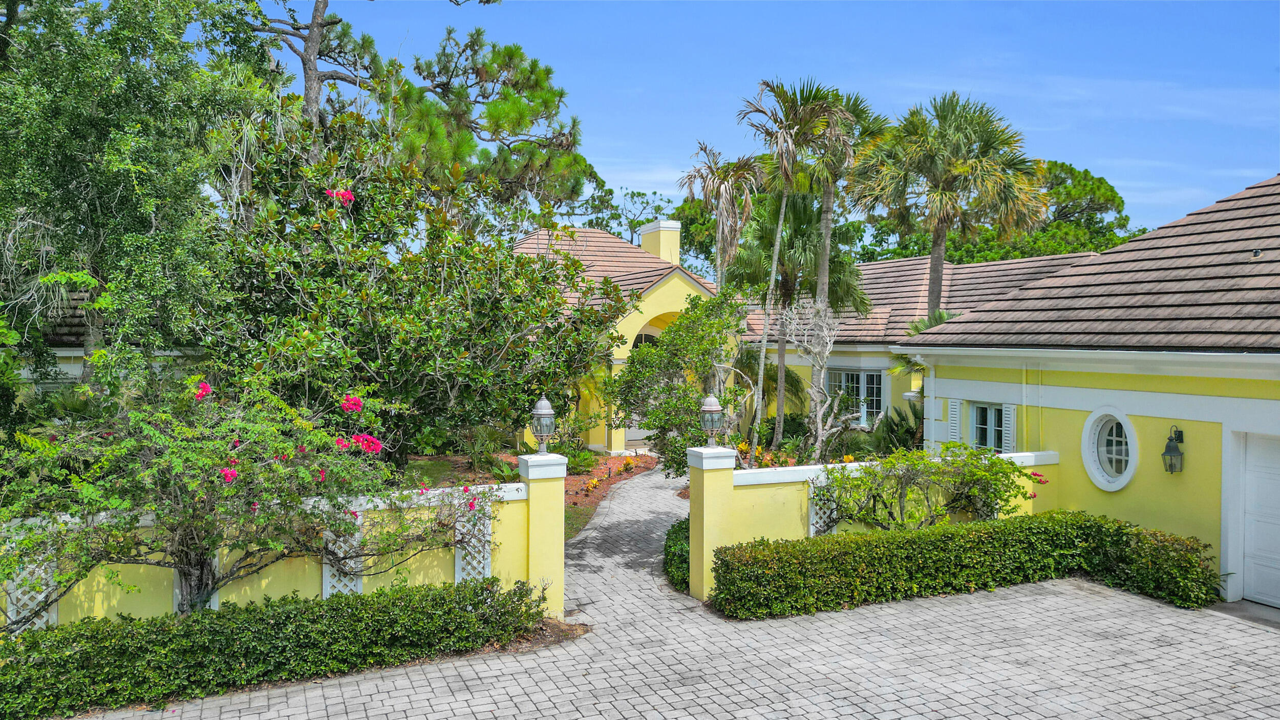 Set within an exclusive gated community, this expansive residence offers more than 6,100 square feet of elegant living space. Featuring five bedrooms, five full baths, and three half baths, the home is built on a timeless foundation, ready to be reimagined to reflect your personal style. A gracious entry opens to a dramatic great room with a fireplace and soaring windows overlooking lush landscaping. The thoughtfully designed floor plan flows seamlessly into the formal dining room, breakfast solarium, and spacious kitchen featuring a large center island and butler's pantry. Designed for effortless indoor-outdoor living, the backyard features a lap pool and spa surrounded by mature landscaping on an expansive 0.86-acre homesite. Offering generous living spaces within a private setting.