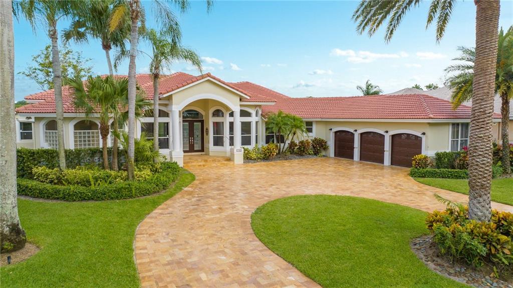 Located on the 9th tee box in the sought-after community of Eagle Trace, this remarkable home oversees beautiful views of the golf course. It also just recently underwent extensive renovations, including an S-tile roof, interior and exterior paint, LVP floor, granite kitchen countertops, range, refrigerator, dishwasher, and LED lighting and USB ports in every room—all brand new. With a triple split floor plan, this property offers an office, home theater, and 3 junior suites, one of which is currently a gym. The master bedroom features an additional room that could be used as a nursery, office, or just a quiet place to read or do some yoga while overlooking the verdant golf course. This ½-acre property has one of the largest yards in Eagle Trace.