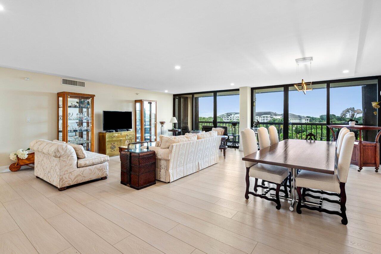 From the moment you enter, you're greeted by panoramic views of lush greenery, beautiful garden views and beyond, creating an instant sense of light, space, and serenity. This incredible opportunity offers a beautifully renovated and expansive 2-bedroom, 2-bath residence at the Envoy within the gated community of Lands of the President. With over 1,800+ square feet of living space, this split-floor-plan condo has been thoughtfully updated throughout, featuring a fully renovated kitchen, updated bathrooms, new flooring, finished ceilings, and more, allowing you to move right in and enjoy, without the cost or disruption of major renovations. The large balcony captures golf course, resort, and city views, perfect for morning coffee or sunset unwinding. Set within a full-service, doorman, pet-friendly, and well-managed building, residents enjoy on-site amenities including a beautiful pool and tennis courts. Ideally located close to the beach, airport, shopping, world-class dining, and Dutchman's Pipe Golf Club, this home is a rare combination of space, views, updates and location. **Make sure to watch the video of Unit 607 at the Envoy**