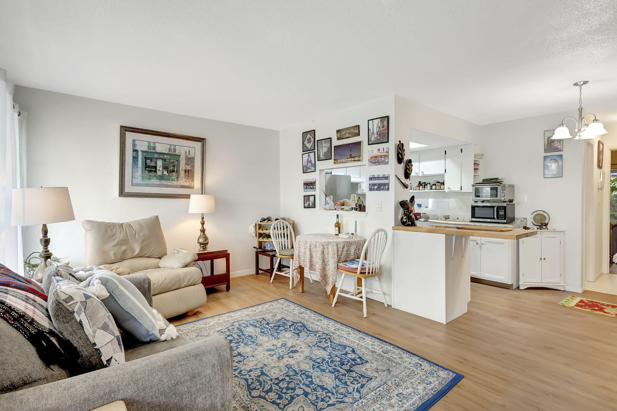 One of the best units in sought-after CEDAR POINTE! Light, bright, and airy 2nd-floor 1BR/1.5BA condo in a desirable 55+ community. This charming residence offers low-maintenance living with vinyl and tile flooring—no carpet! The spacious bedroom features two walk-in closets plus additional linen and hallway storage. Enjoy a well-equipped kitchen with newer appliances and a private screened patio, with new screens and framing, overlooking a serene, landscaped setting . Community amenities include a pool, clubhouse, shuffleboard, and grilling area. Conveniently located near shopping, dining, beaches, and hospital. Maintenance fee covers cable, common areas, lawn care, parking, and laundry facilities—perfect for easy Florida living!