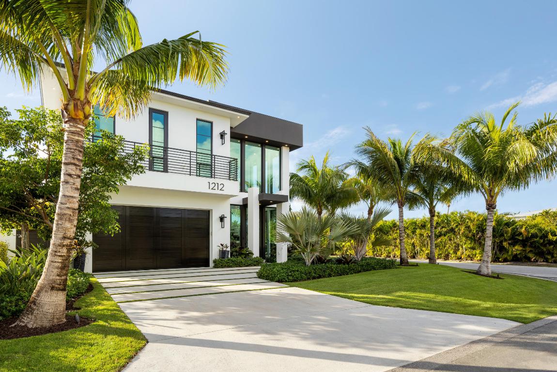 Juniper House offers a rare, turn-key opportunity in Delray Beach's coveted Palm Trail neighborhood. Inspired by the strength and beauty of the Juniper tree, this brand-new construction residence by Stamm Development Group is offered completely furnished, with a thoughtfully curated interiors package by Ava Gray Interiors.
 
This expansive 4-bedroom, 5-bathroom single-family home spans 5,569 total square feet, seamlessly blending modern architecture with timeless coastal charm. The grand double-height foyer opens to a light-filled, open-concept living space designed for everyday living and effortless entertaining. The gourmet kitchen anchors the main living area and features a gas range, coffee bar, oversized island, butler pantry and an adjacent wet bar outfitted with 200 bottle wine tower. The expansive flex room completes and includes a seamless patio access to the beautiful outdoors and a private backyard oasis complete with a 10' x 20' pool and spa, covered lanai, and outdoor kitchen with gas grill and beverage center.
 
Upstairs, the primary suite is a serene retreat with a private balcony, dual walk-in closets, morning bar, and spa-like bath. Three additional ensuite bedrooms, a loft, and multiple balconies provide ample space for family and guests. Throughout the home, custom lighting, organic textures, and elevated finishes add warmth and character. Closets, shades, and drapery are installed and included, as shown. Custom closets, automatic shades and drapes are included in this turn key residence. 
 
Highlights include:
" Offered fully furnished  move-in ready to enjoy this season
" Brand new construction
" 1 year New Construction warranty
" Corner lot exposure for maximum natural light
" Private elevator
" Outdoor kitchen
" Walkable location  less than 1 mile to both the beach and Atlantic Avenue
" Connection in butlers pantry for 2nd Laundry Room if desired 
 
Juniper House captures the essence of South Florida livingan exceptional blend of luxury, comfort, and coastal sophistication in one of Delray Beach's most desirable locations.