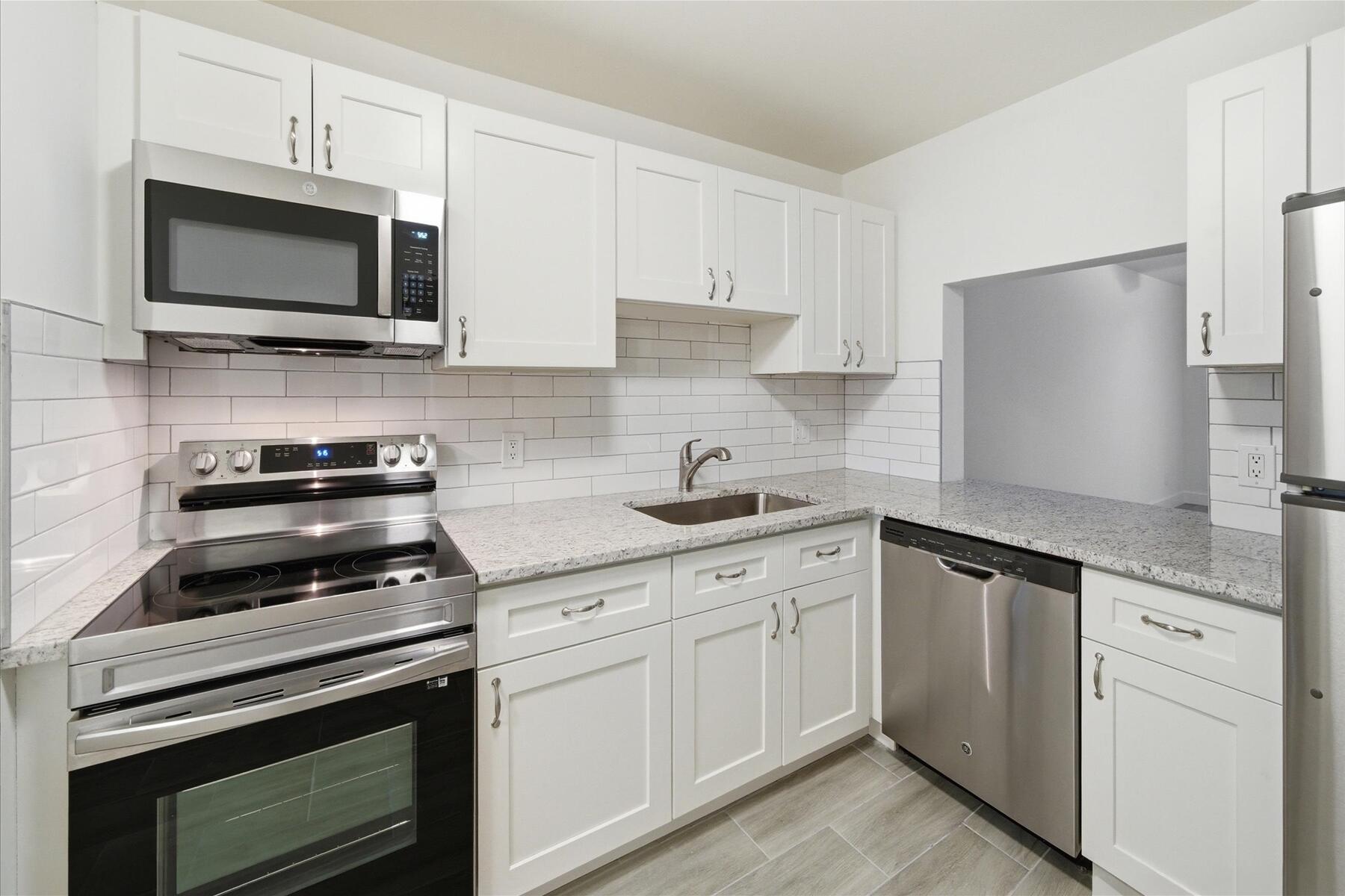 Beautifully renovated 2-bedroom, 2-bath condo in a sought-after 55+ community! This move-in-ready residence offers exceptional value with major updates already completed, including a new A/C, 2023 water heater, stainless steel appliances, luxury vinyl flooring throughout, and tastefully remodeled bathrooms. In-unit laundry. Enjoy relaxing by the community pool and the ease of low-maintenance living, with the HOA covering the roof. For added peace of mind, the home includes a 1-year Choice Home Warranty covering HVAC, electrical, plumbing, and appliances. Qualified buyers may be eligible for a mortgage rate buydown of up to 3%, and seller financing is available. Don't miss this opportunity to enjoy affordable, carefree Florida living in a well-maintained community!