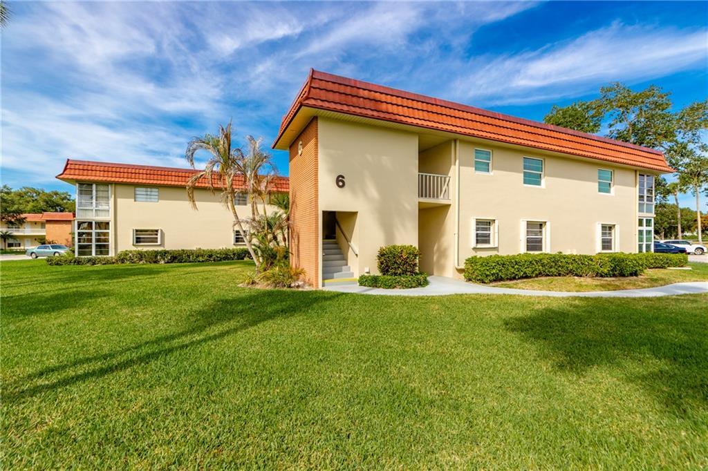 Turnkey 2BR/2BA condo in Vista Royale w/a bright, beachy feel & peaceful golf views. This unit features hurricane-impact windows throughout, except for the sliders/lanai, along w/a '23 A/C + '22 water heater. Furniture included, making this the perfect move-in-ready seasonal retreat, year-round residence, or investment opportunity. Residents enjoy resort-style living along a scenic 27-hole golf course just minutes from beaches, shopping, dining, & entertainment. Community amenities include 4 clubhouses, heated pools, fitness center, tennis & pickleball courts, a full social calendar & more!