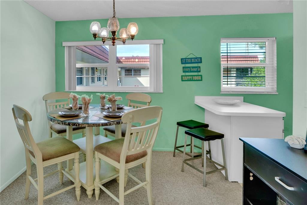 Turnkey 2BR/2BA condo in Vista Royale w/a bright, beachy feel & peaceful golf views. This unit features hurricane-impact windows throughout, except for the sliders/lanai, along w/a '23 A/C + '22 water heater. Furniture included, making this the perfect move-in-ready seasonal retreat, year-round residence, or investment opportunity. Residents enjoy resort-style living along a scenic 27-hole golf course just minutes from beaches, shopping, dining, & entertainment. Community amenities include 4 clubhouses, heated pools, fitness center, tennis & pickleball courts, a full social calendar & more!