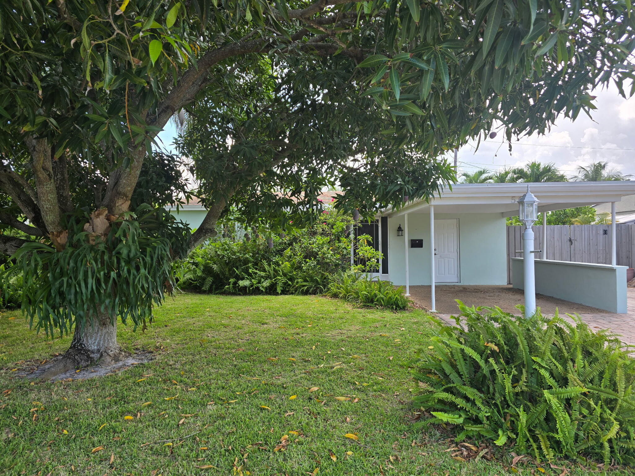 This Oakland Park home reflects true pride of ownership at every turn. The layout flows naturally from room to room. Light, bright, and welcoming from the moment you walk in. The heavy lifting is done; roof replaced 2020, brand new AC with all new ductwork 2025, updated electrical panel, impact windows, and a full cast-iron to PVC drain line replacement. Updated bathrooms, newer appliances, and crown molding throughout. Outside the landscaping stops you in your tracks; lush, curated tropical plantings, including stunning, red crown ginger. The backyard is perfectly scaled for pets and includes a storage shed. Minutes from schools and houses of worship. The big ticket items are done. The charm is already there.