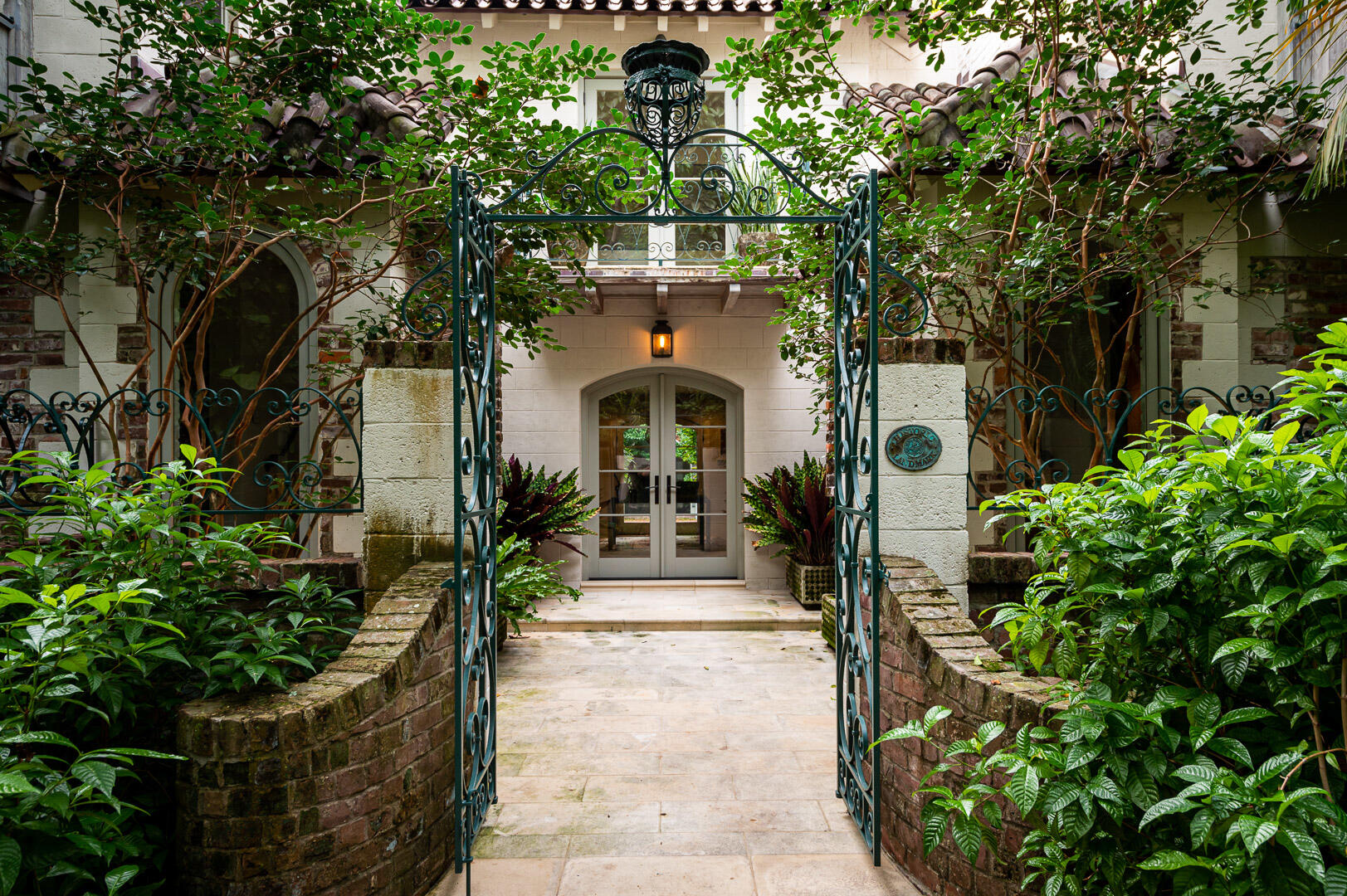 Architecturally significant, renovated landmarked property in historic, extremely desirable, Phipps Plaza. The house was originally designed by Belford Schoumate-who came to south Florida in the 1930's and designed and/ or renovated more than 1500 buildings-he actually lived and had his office in Phipps Plaza. The property was redesigned by Jeff Smith Architectural Firm-all new systems to include plumbing, electrical, A/C, new roof, all impact windows and doors- updated in 2014. Full of charm and in pristine condition-Gourmet kitchen-top of the line appliances, exceptional finishes-2 master suites- Waterworks fixtures and Herpel Tile in the bathrooms-4 fireplaces, balconies and a large patio overlooking the pool and screened in cabana. Mario Navarro, a prominent Palm Beach landscape architect, designed the outdoor space. Conveniently located in the center of Palm Beach, near Worth Avenue, The Breakers and the Lake Trail-on a private, quiet cul- de- sac. A true GEM!